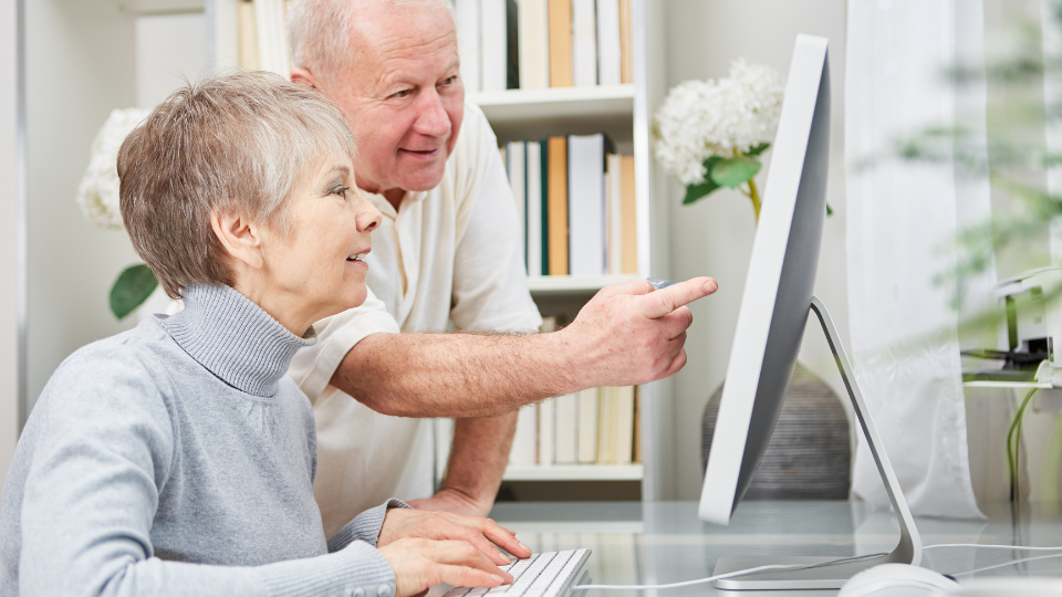 Senior Citizens as Couple Learn about Computer