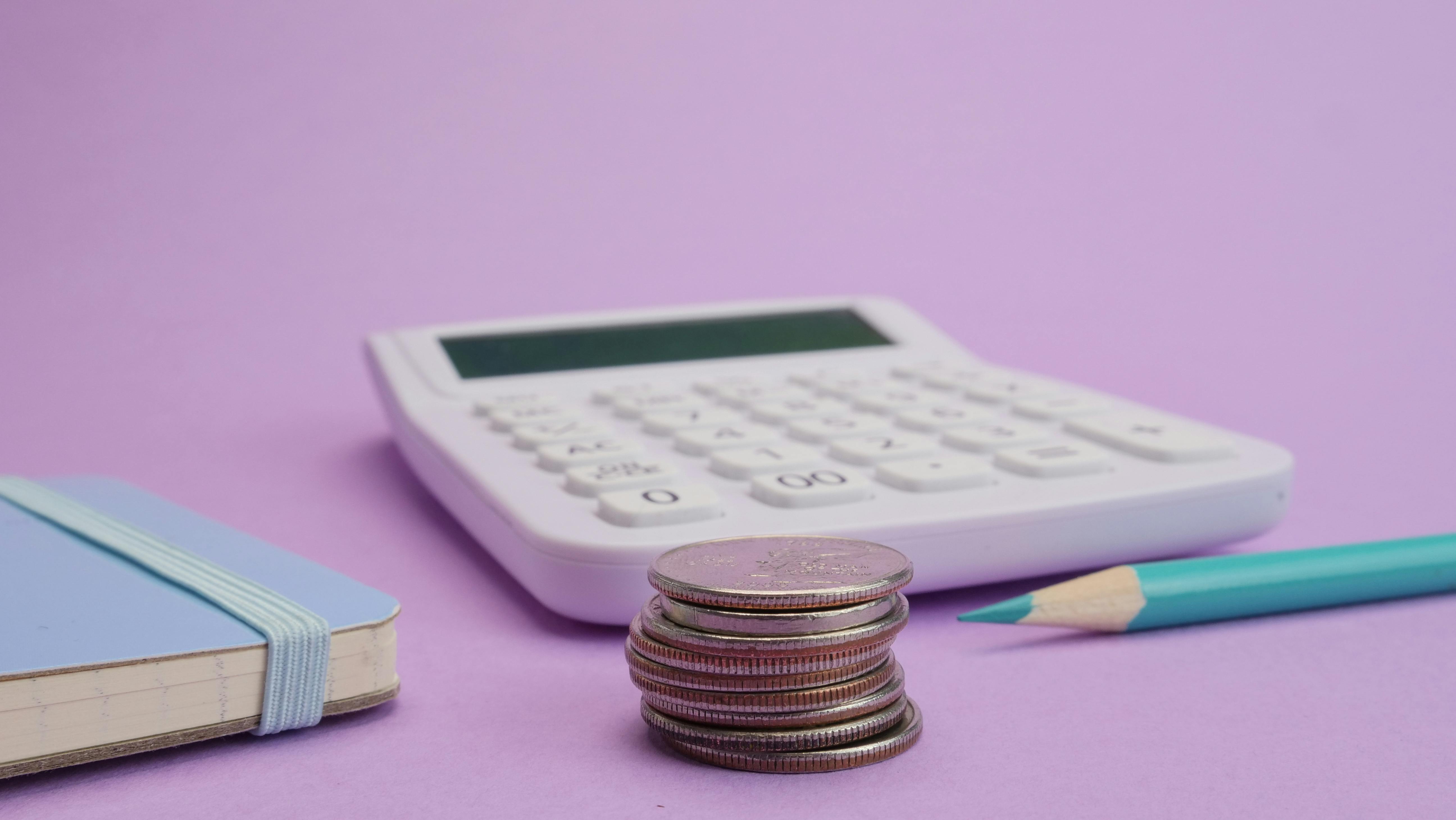 Finance props on purple background Finance props on purple background