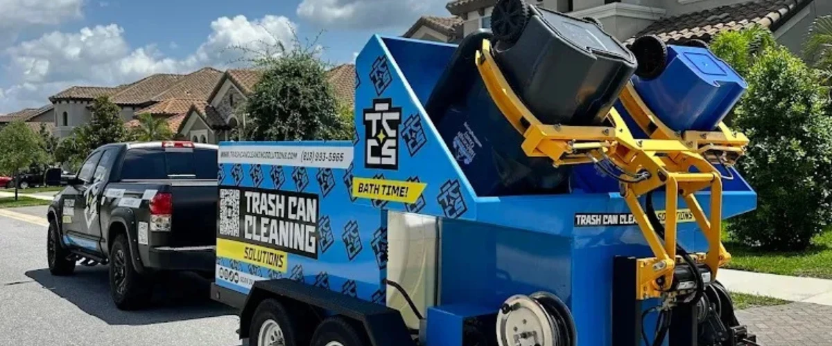 Residential trash can cleaning service in front of homes