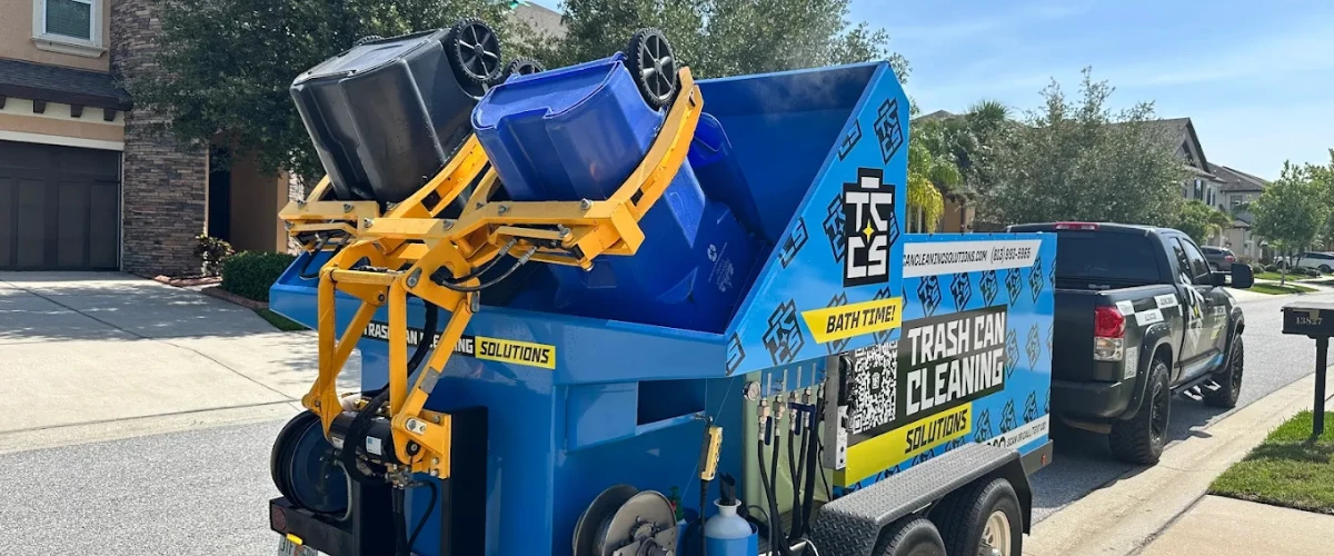 Residential trash can cleaning service in front of homes