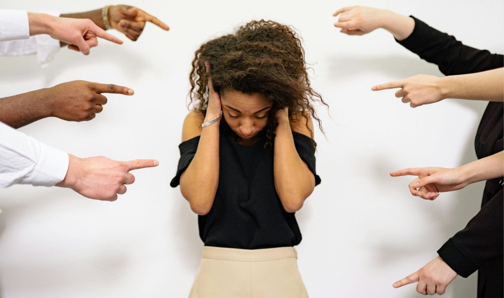 A woman feeling self-doubt, which is a common pain points of online business A woman feeling self-doubt, which is a common pain points of online business