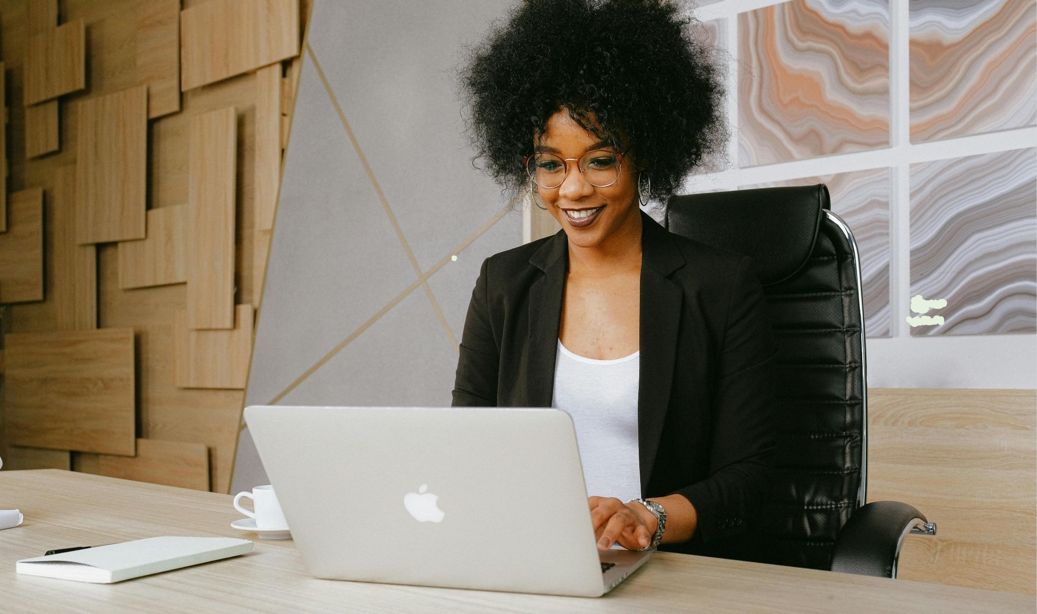 A business woman on her laptop using a sales funnel for beginners