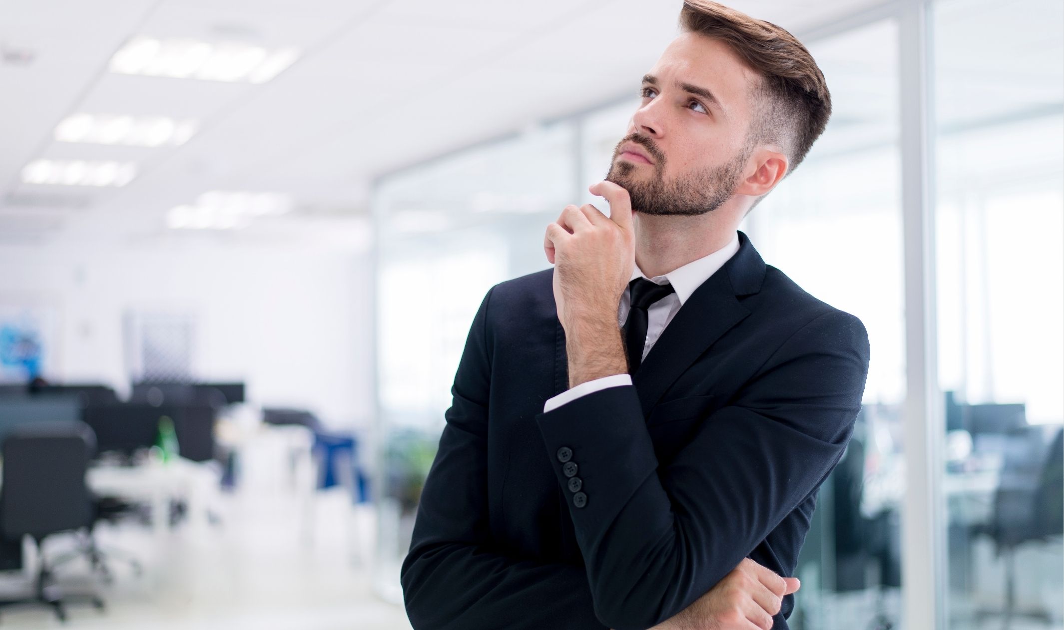 A business man contemplating payment automation for online business