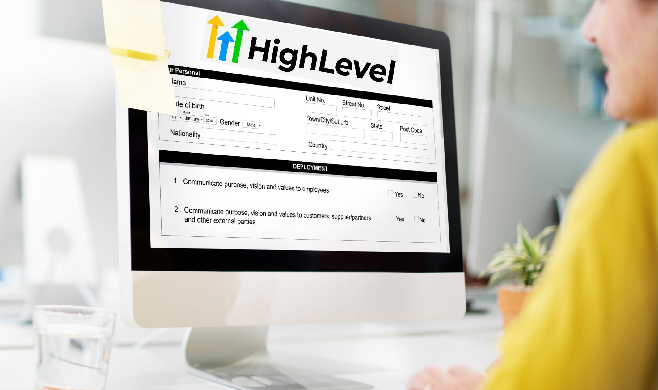 A woman using the Go HighLevel form builder A woman using the Go HighLevel form builder