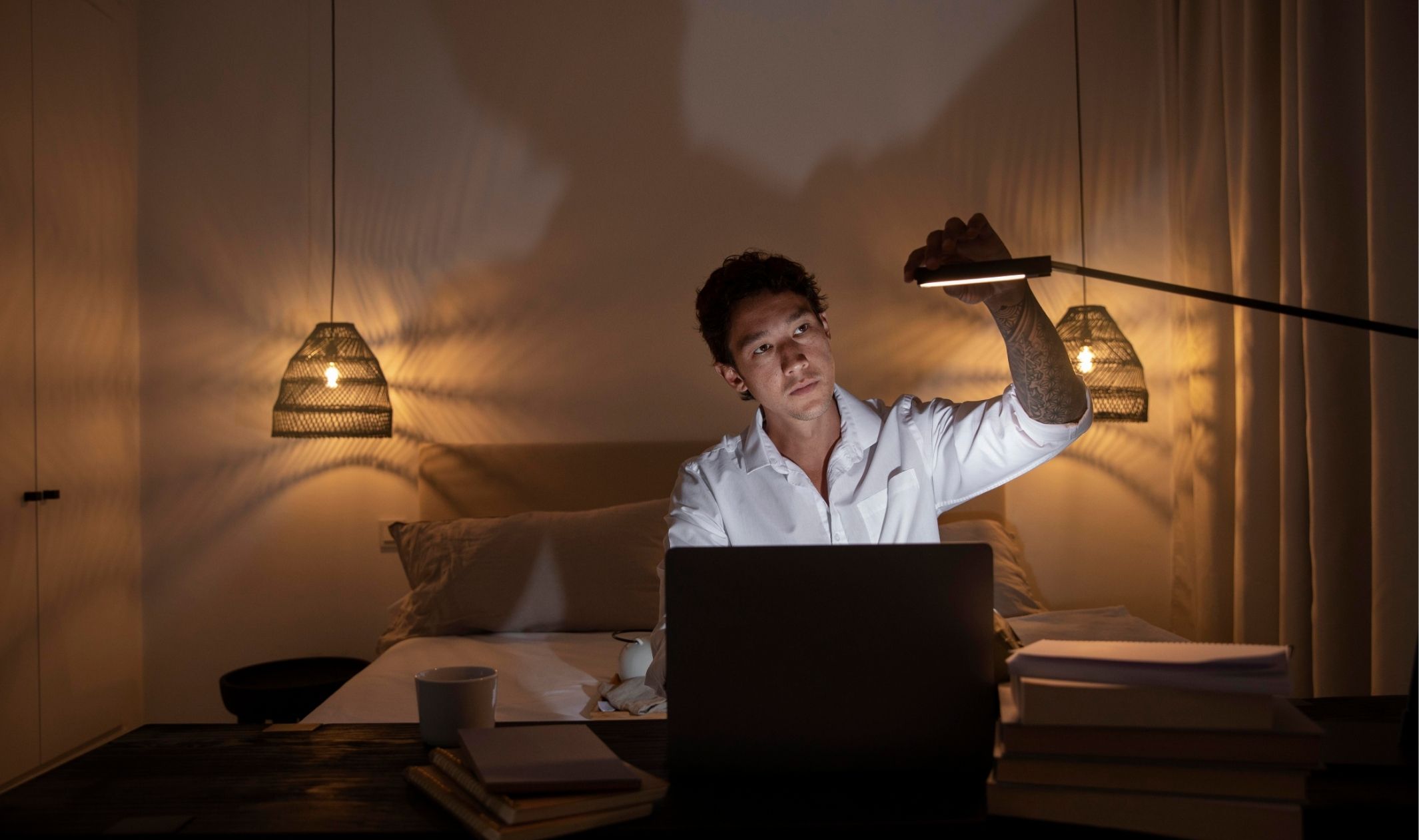 A business man working late at night because he doesn't have realistic entrepreneur expectations A business man working late at night because he doesn't have realistic entrepreneur expectations