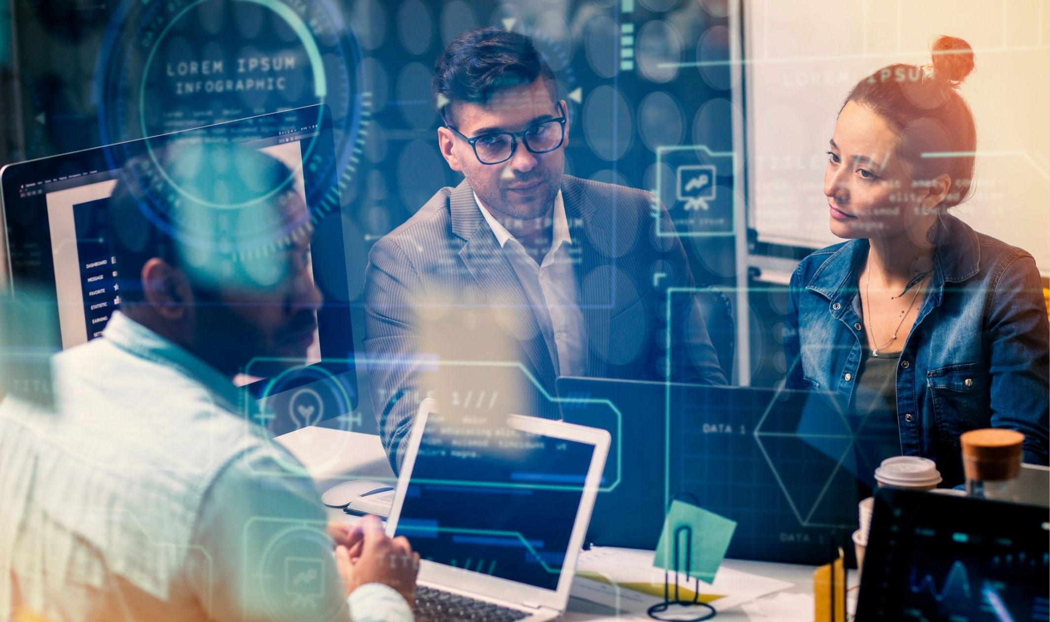 A group of business owners setting up AI systems on a computer to achieve freedom through automation A group of business owners setting up AI systems on a computer to achieve freedom through automation