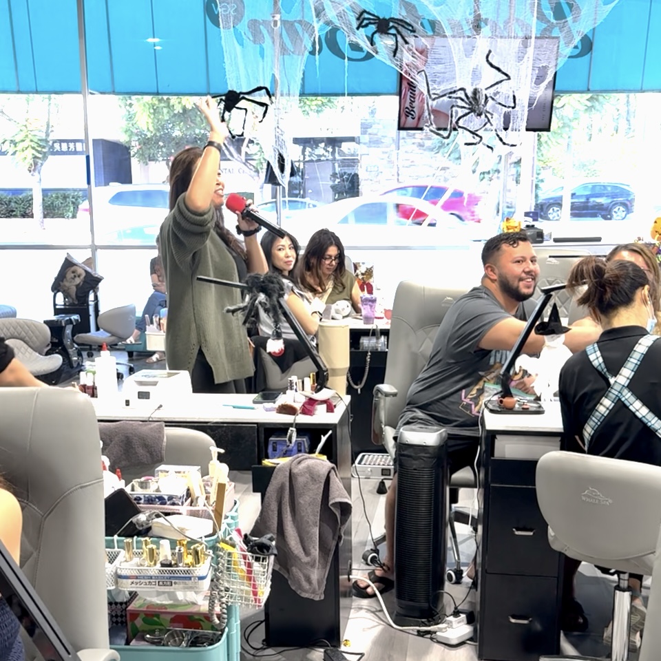 BeautyBar SGV Team Singing and Dancing – BeautyBar SGV staff and guests sharing a fun karaoke moment, dancing and singing together in a joyful atmosphere.