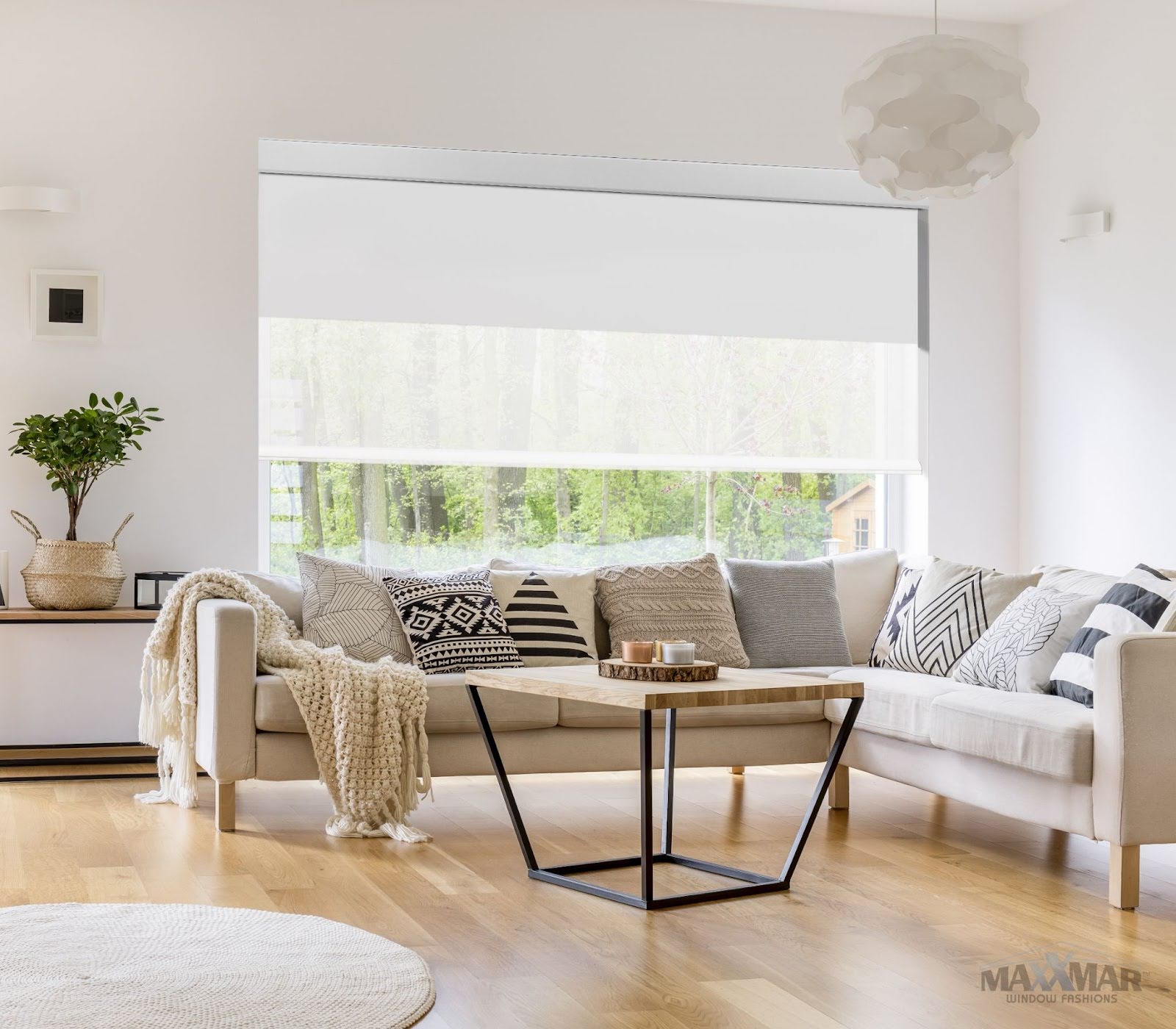 Grande Cassette Roller Shades by Maxxmar Window Fashions installed by Fasada Windows and Doors Oakville over a large living room window. Grande Cassette Roller Shades by Maxxmar Window Fashions installed by Fasada Windows and Doors Oakville over a large living room window.