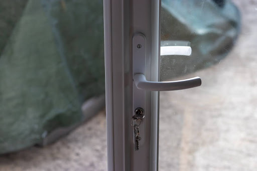 Showing white handle on Multipoint Locking System on a French patio door available from Fasada Windows and Doors. Showing white handle on Multipoint Locking System on a French patio door available from Fasada Windows and Doors.