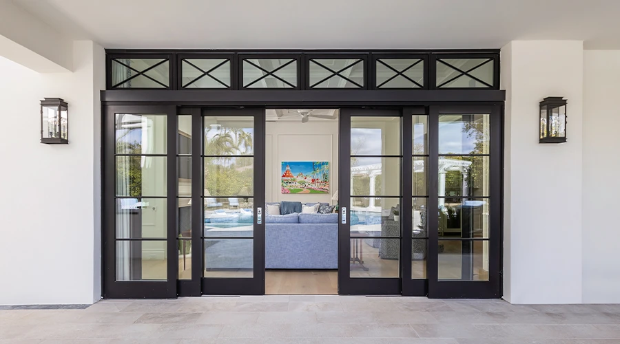 Pella patio doors with large glass panels connecting indoor and outdoor spaces