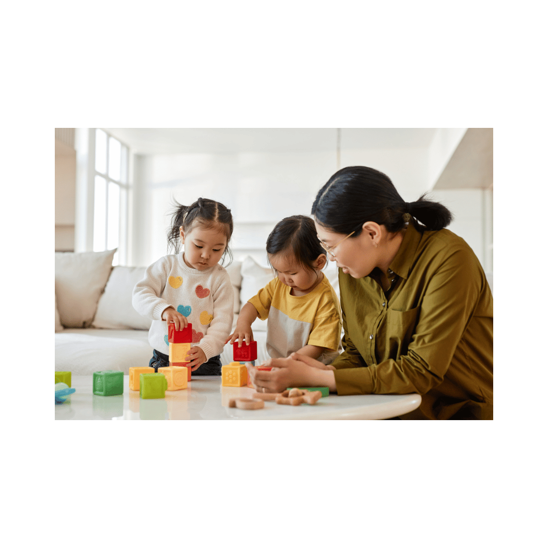 Mompreneur helping her kids develop fine motor skills Mompreneur helping her kids develop fine motor skills