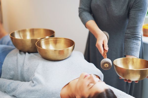 Crystal bowls being played for relaxation and tranquility.