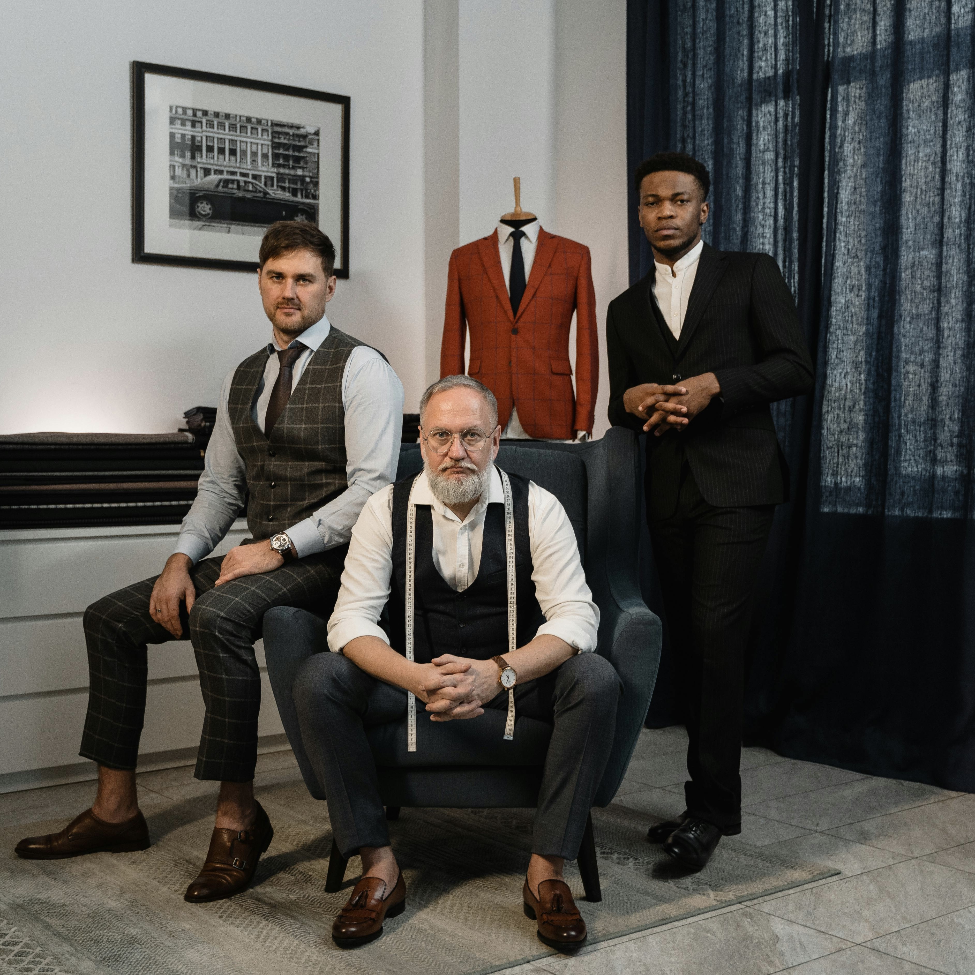 men getting clothes tailored