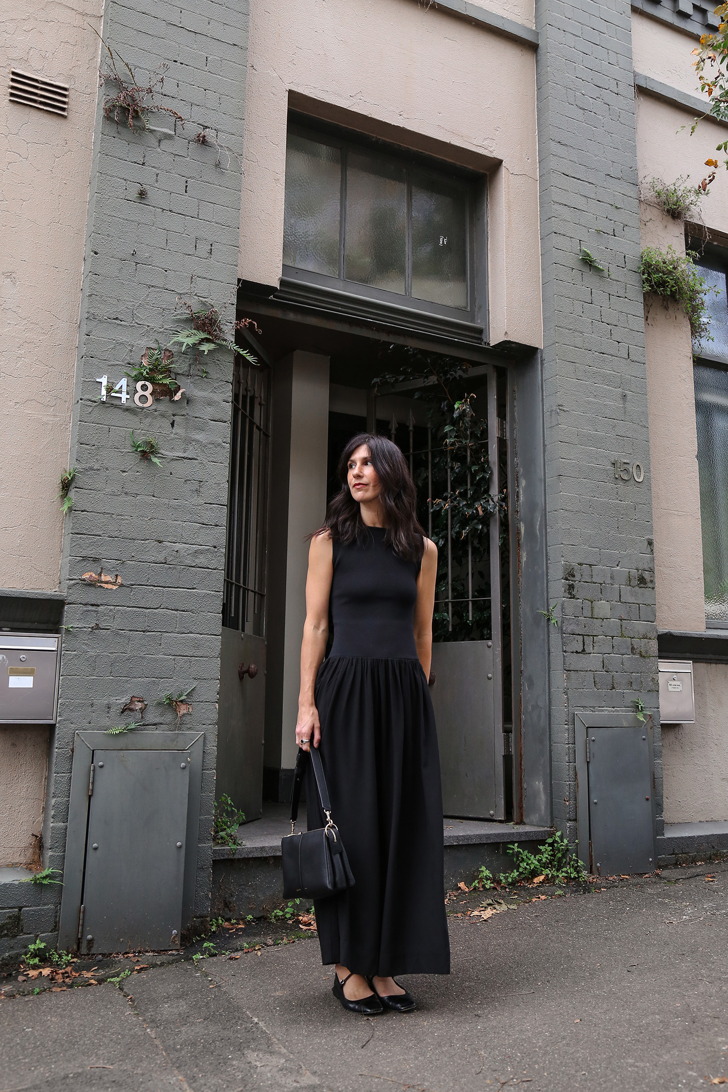 Beautiful woman in all black outfit.