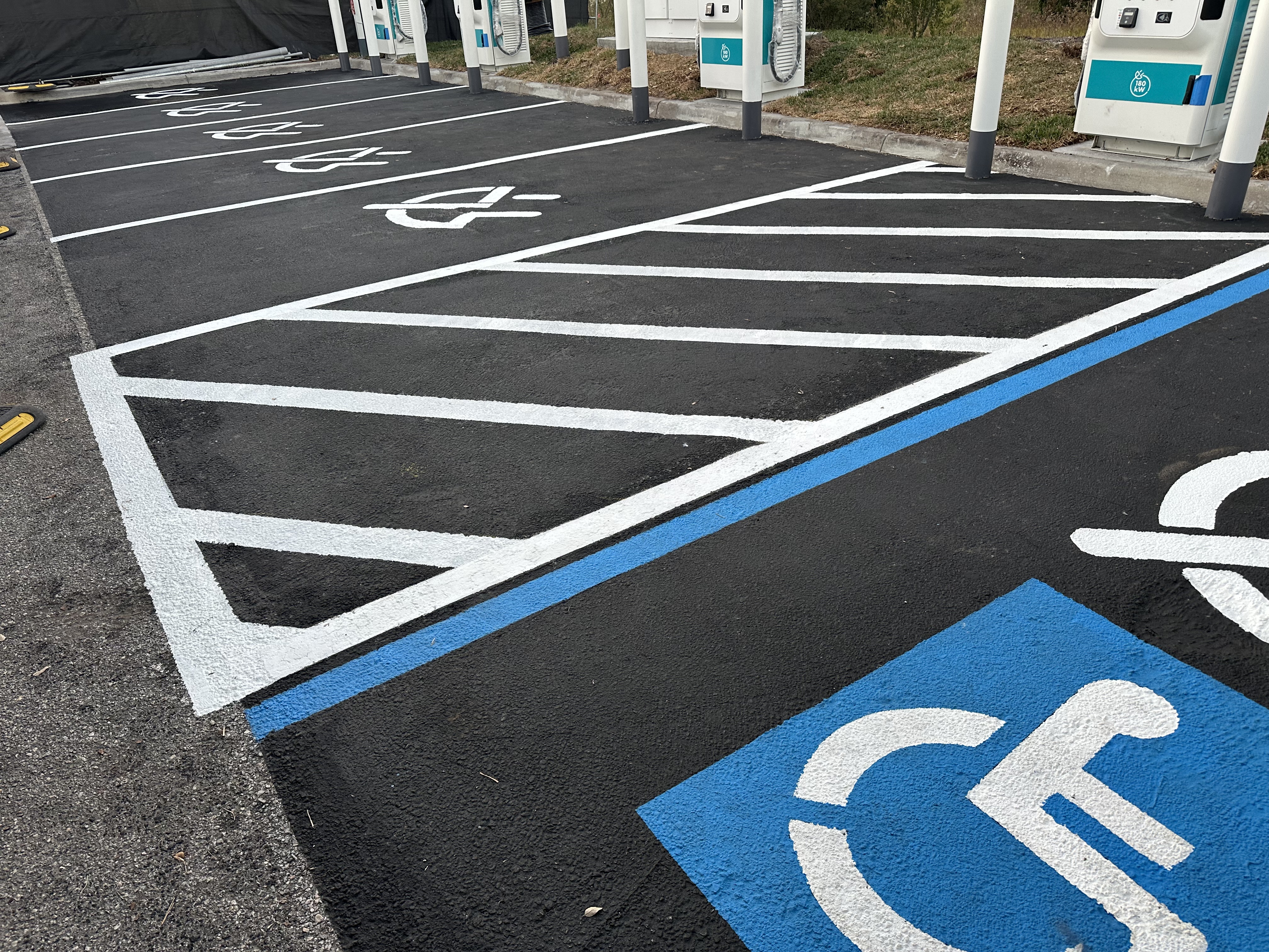 Parking lot resurfacing before and after