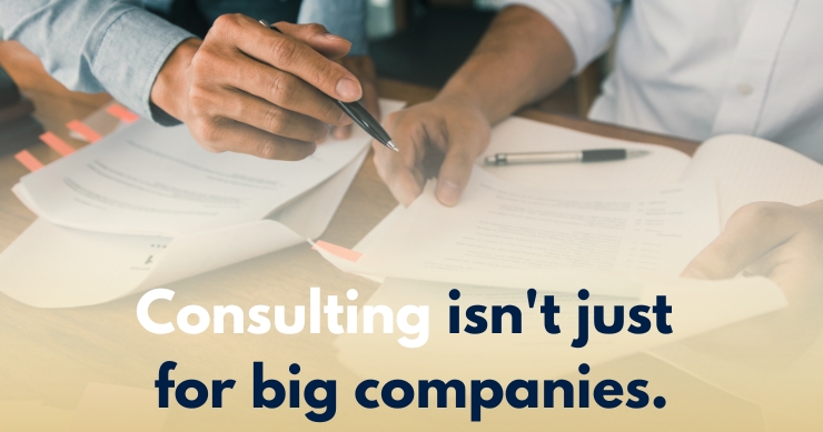 Small business owner reviewing financial reports for taxes payment