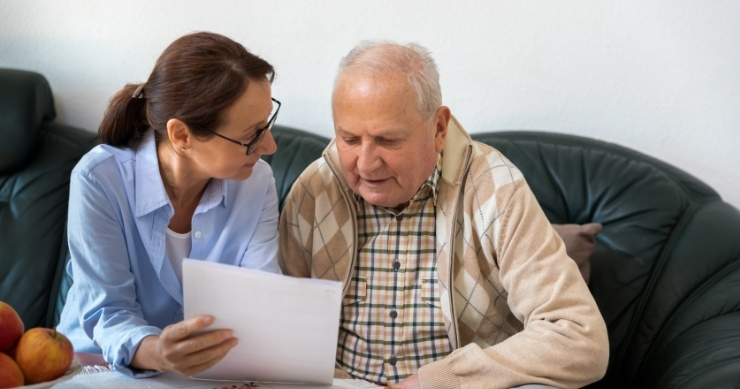 Senior Hispanic adult getting Medicare advice in the United States