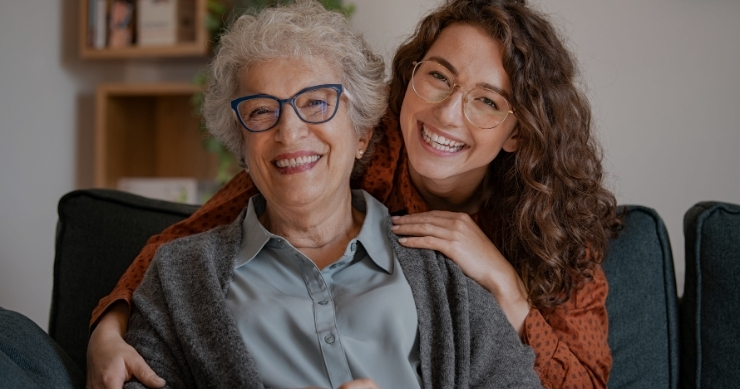 Senior parent reviewing Medicare coverage with her daughter
