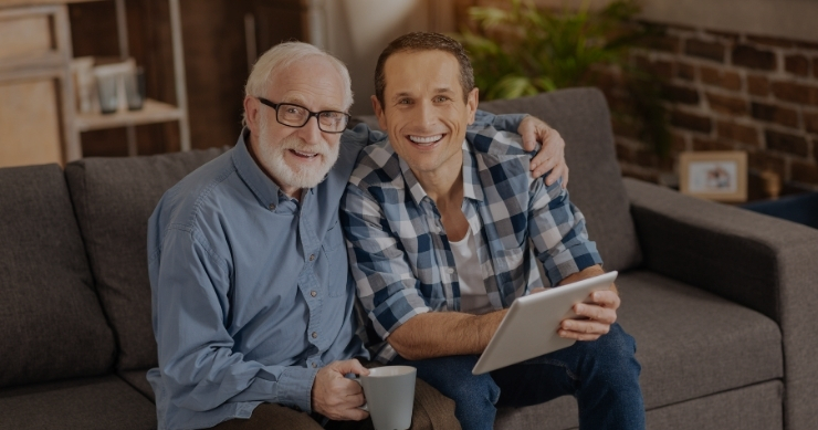 Senior parent reviewing Medicare coverage with his son