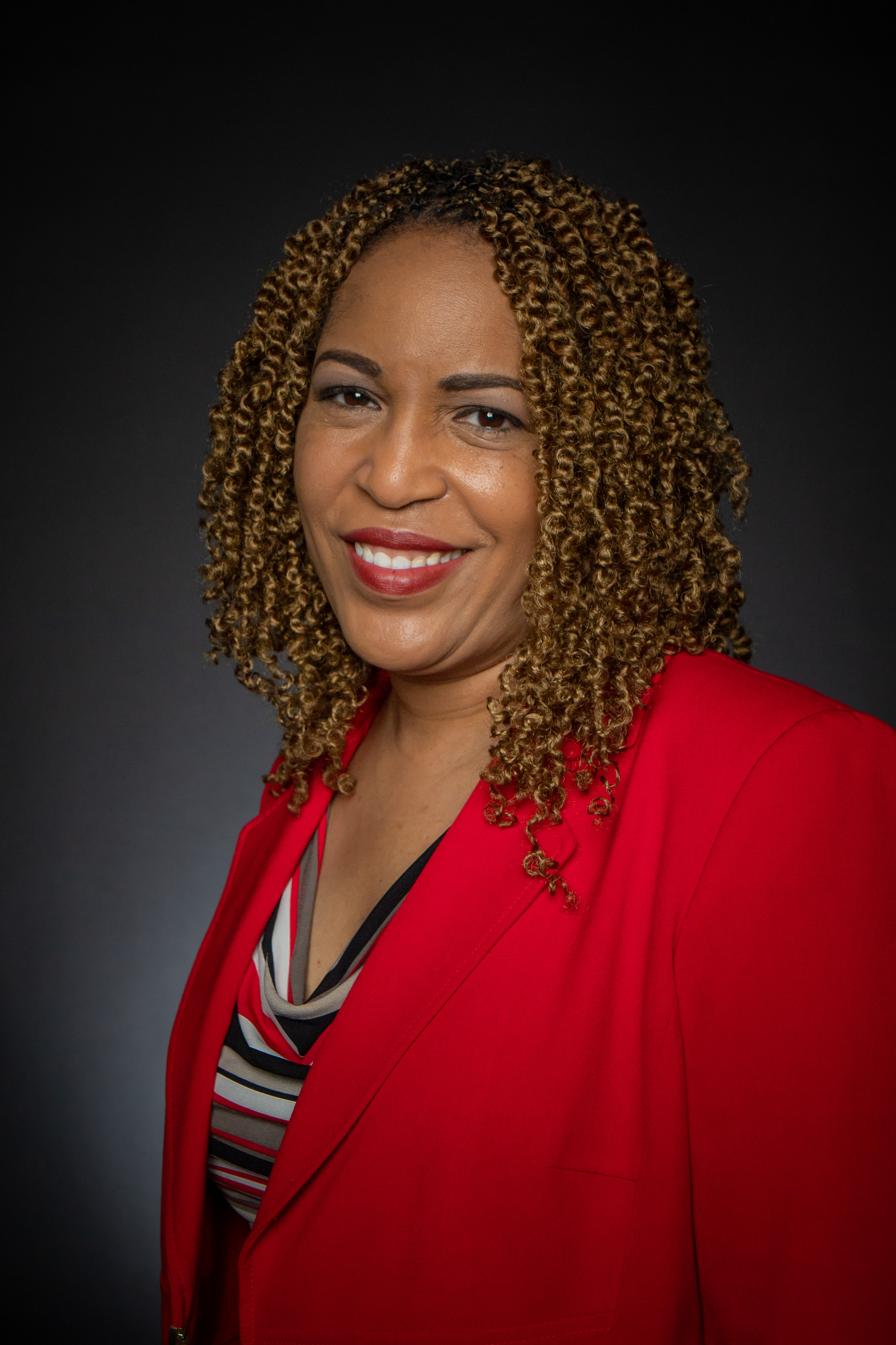 Professional woman in red jacket Professional woman in red jacket