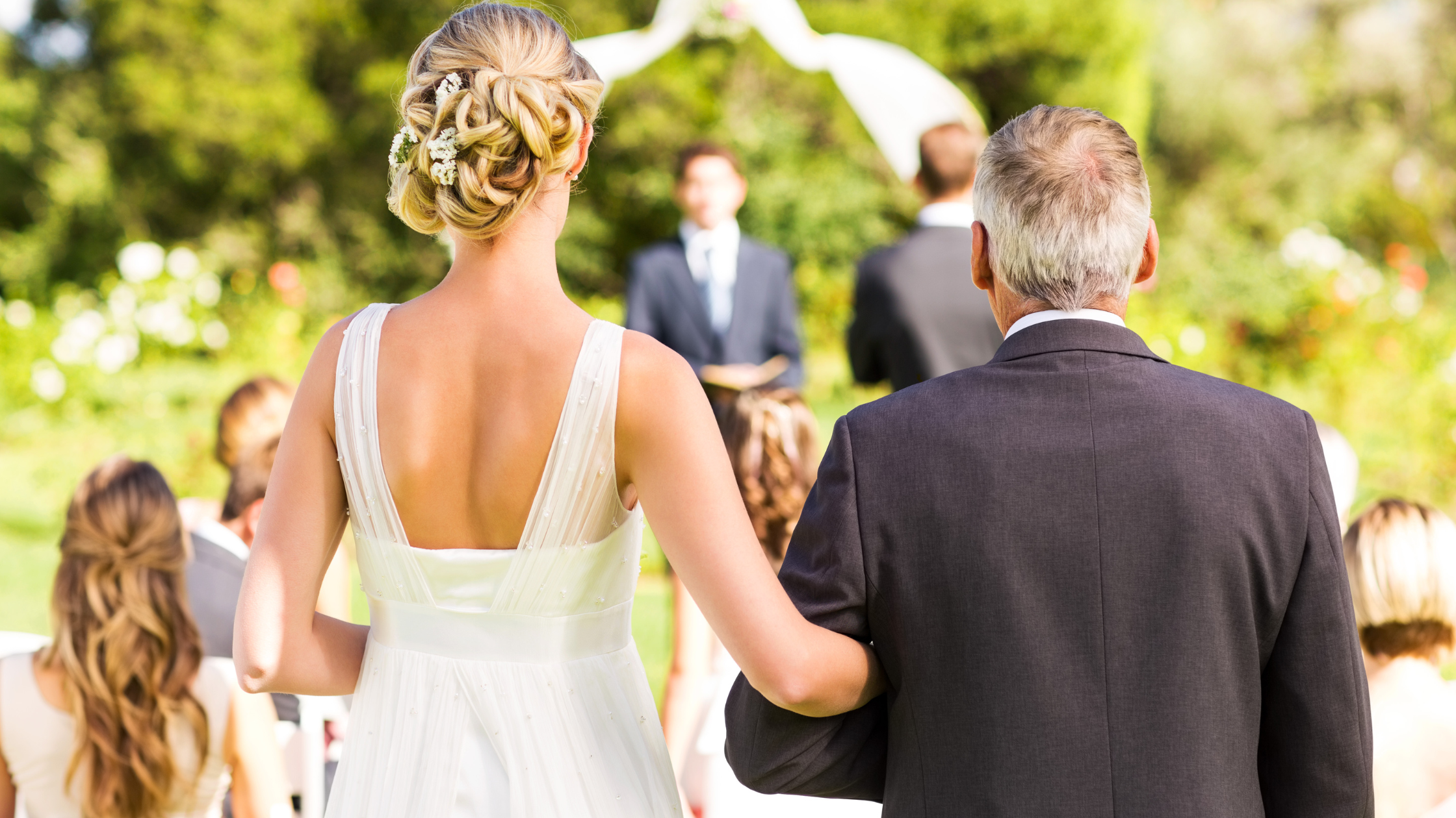 Father Walking Daughter Down The Aisle on her Wedding Day