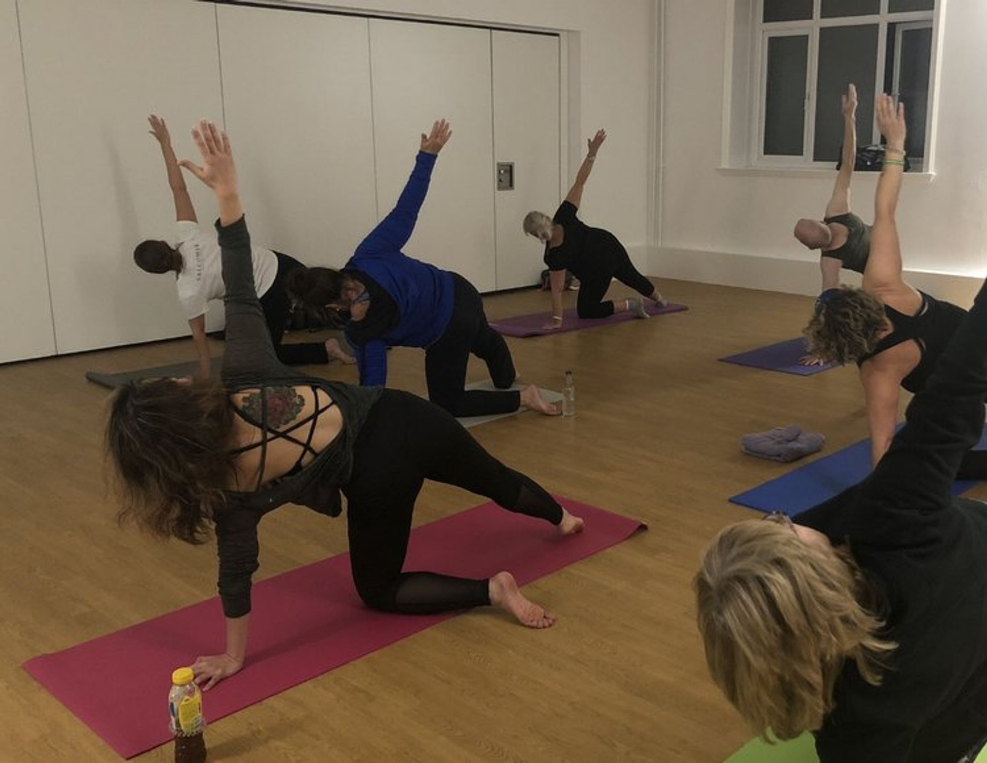 The yoginis and yogis of John Godber Centre, Hucknall Nottingham strengthening their 