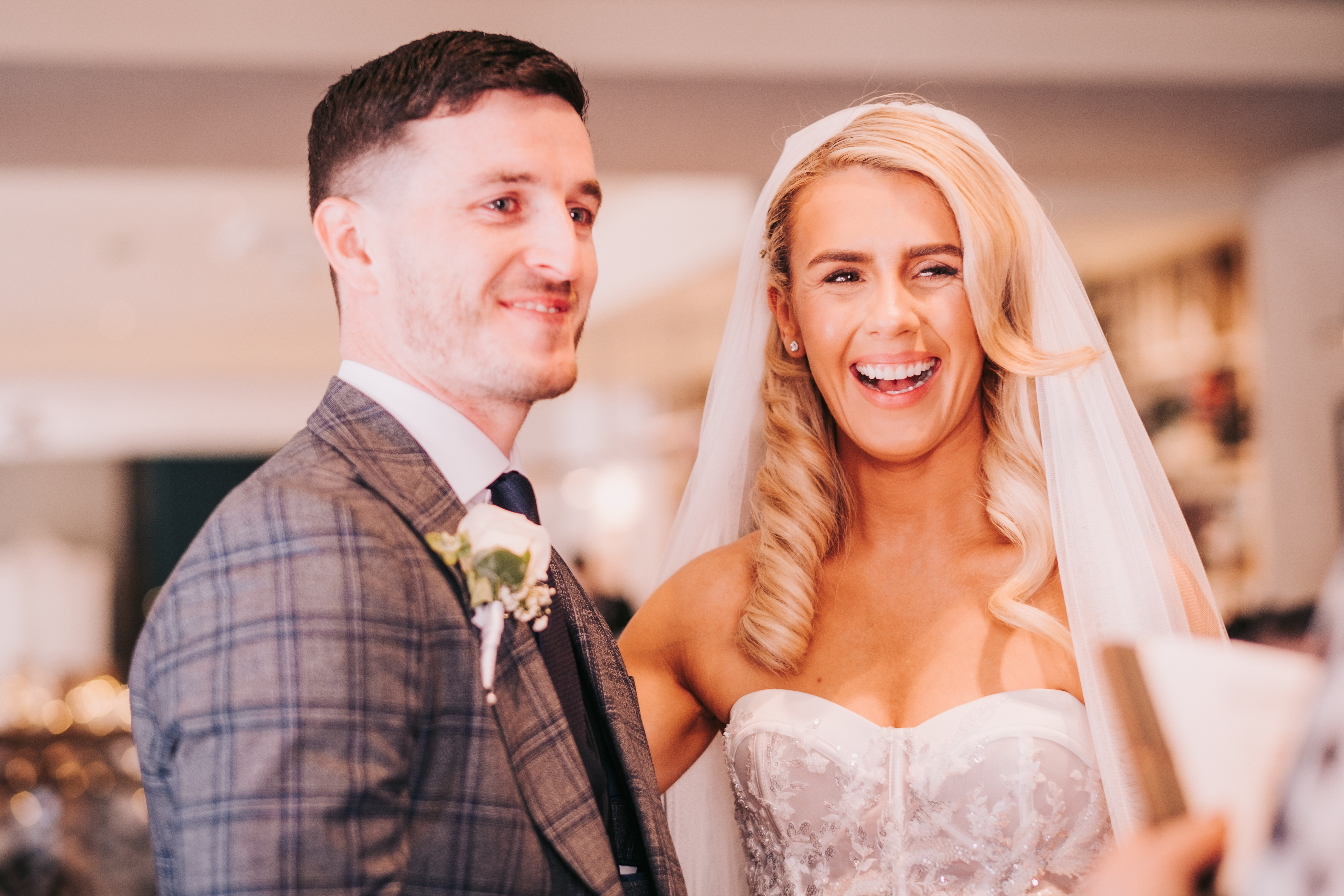 Bride laughing, groom smiling during wedding ceremony at Citation in Merchant City, Glasgow, Bride laughing, groom smiling during wedding ceremony at Citation in Merchant City, Glasgow,