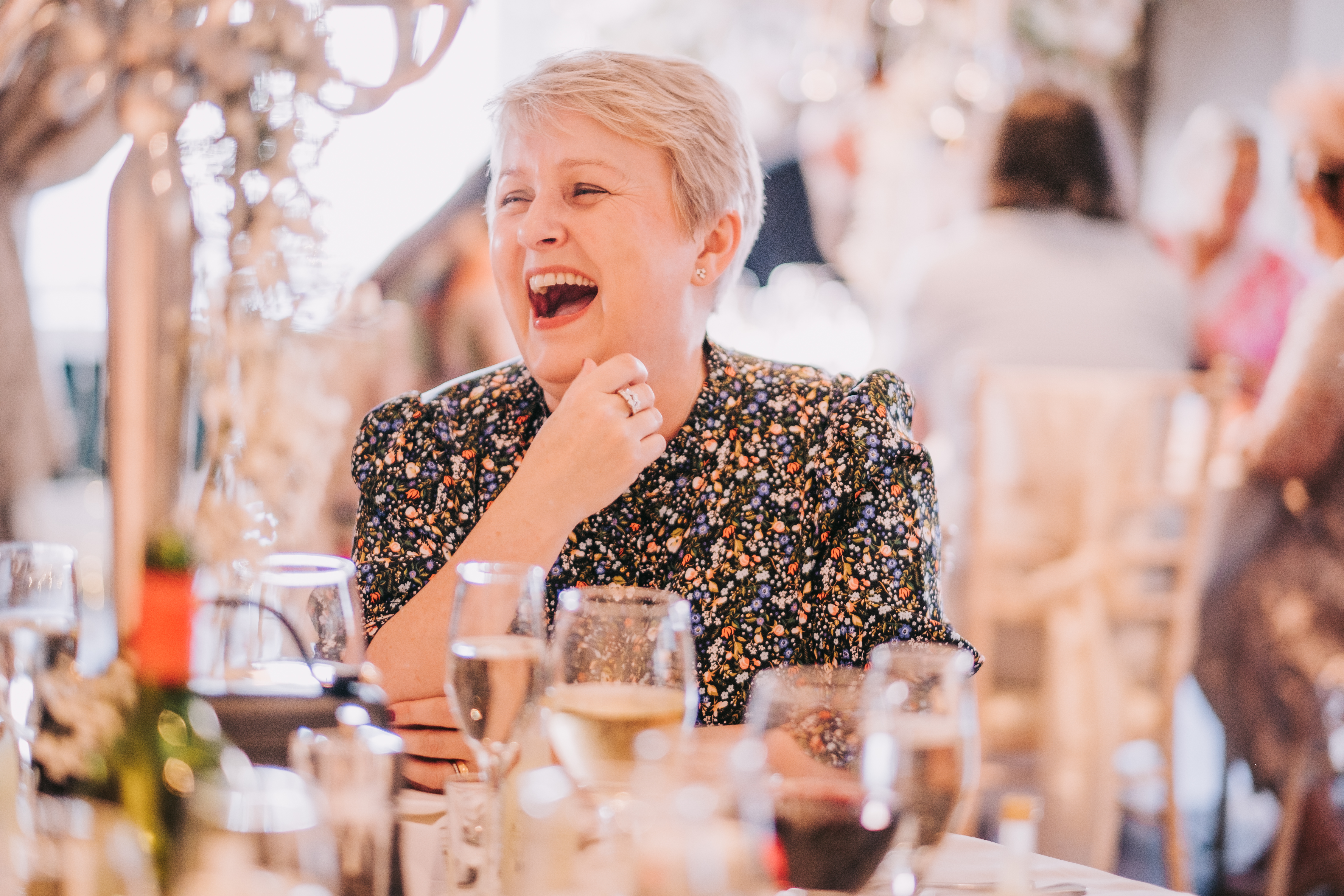 Wedding guest laughing during the evening celebrations at Citation, Merchant City, Glasgow Wedding guest laughing during the evening celebrations at Citation, Merchant City, Glasgow