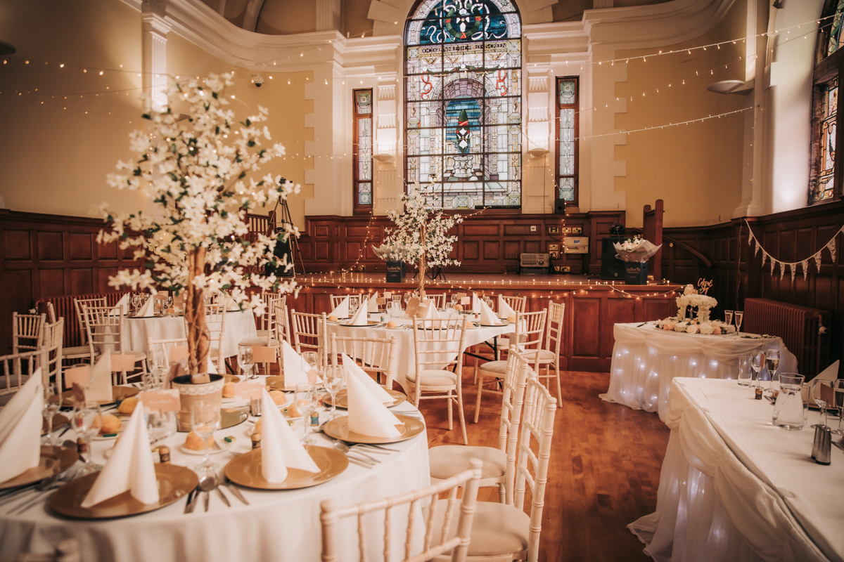 Final wide shot of Pollokshields Burgh Hall decorated for speeches and evening reception. Final wide shot of Pollokshields Burgh Hall decorated for speeches and evening reception.
