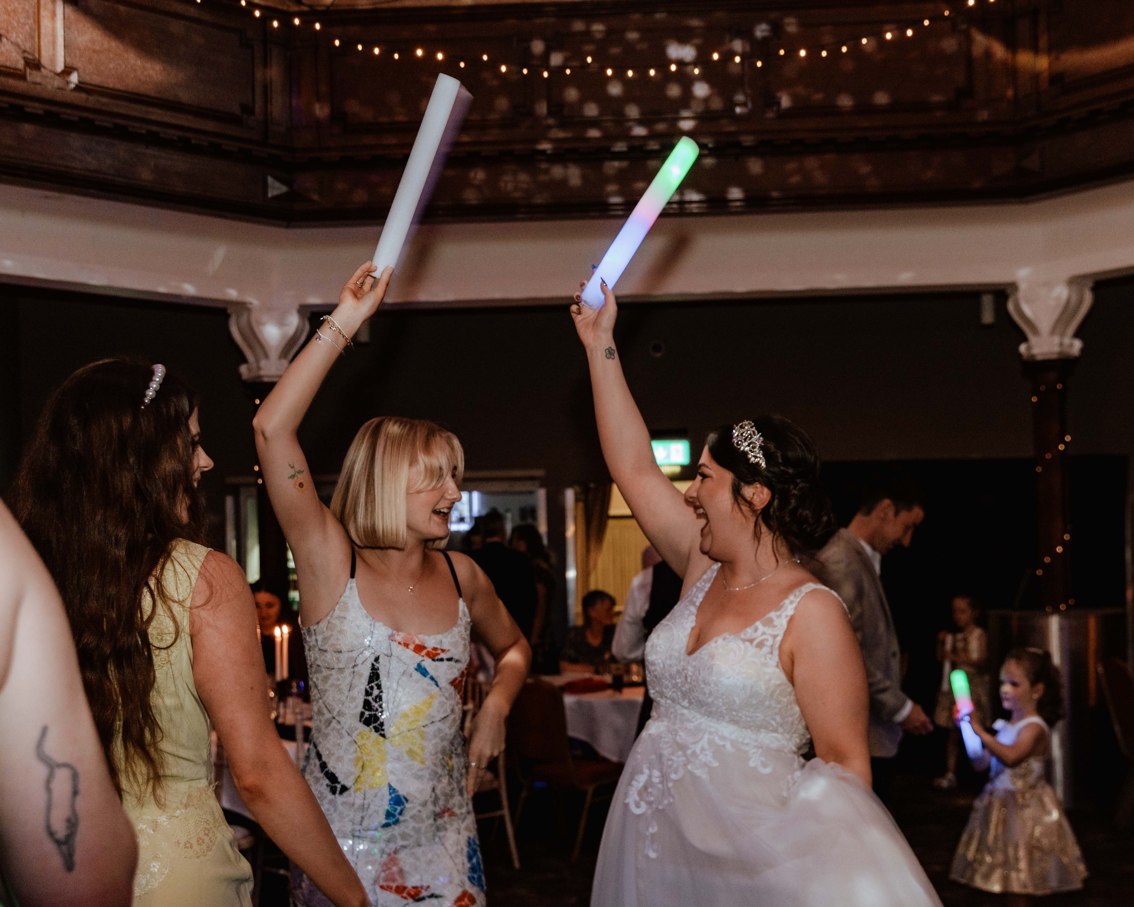 Bride dancing with wedding guests, Saint Luke's, Glasgow Bride dancing with wedding guests, Saint Luke's, Glasgow