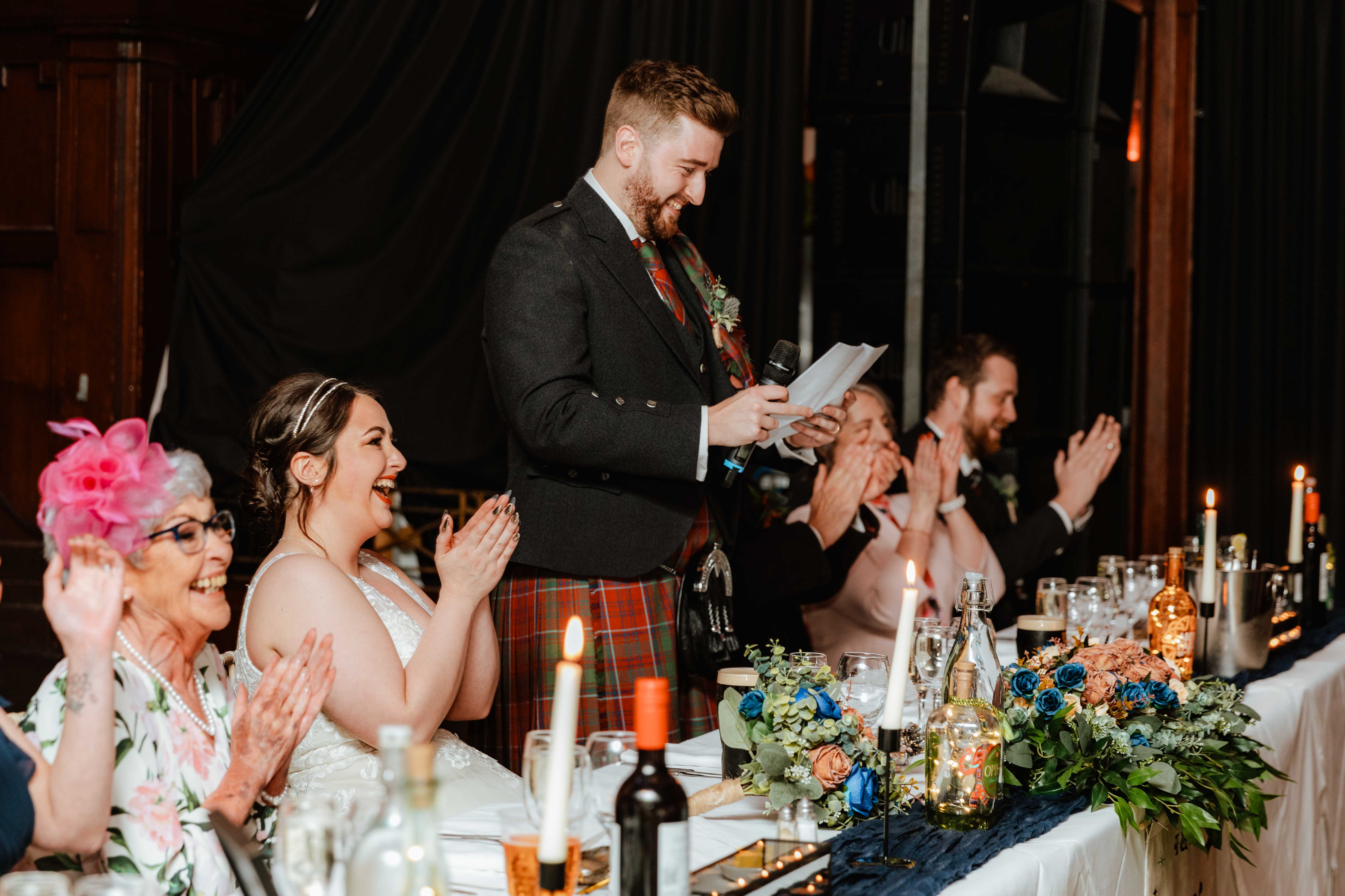 Evening drinks and laughter shared as groom does his speech in Saint Luke's, Glasgow. Evening drinks and laughter shared as groom does his speech in Saint Luke's, Glasgow.