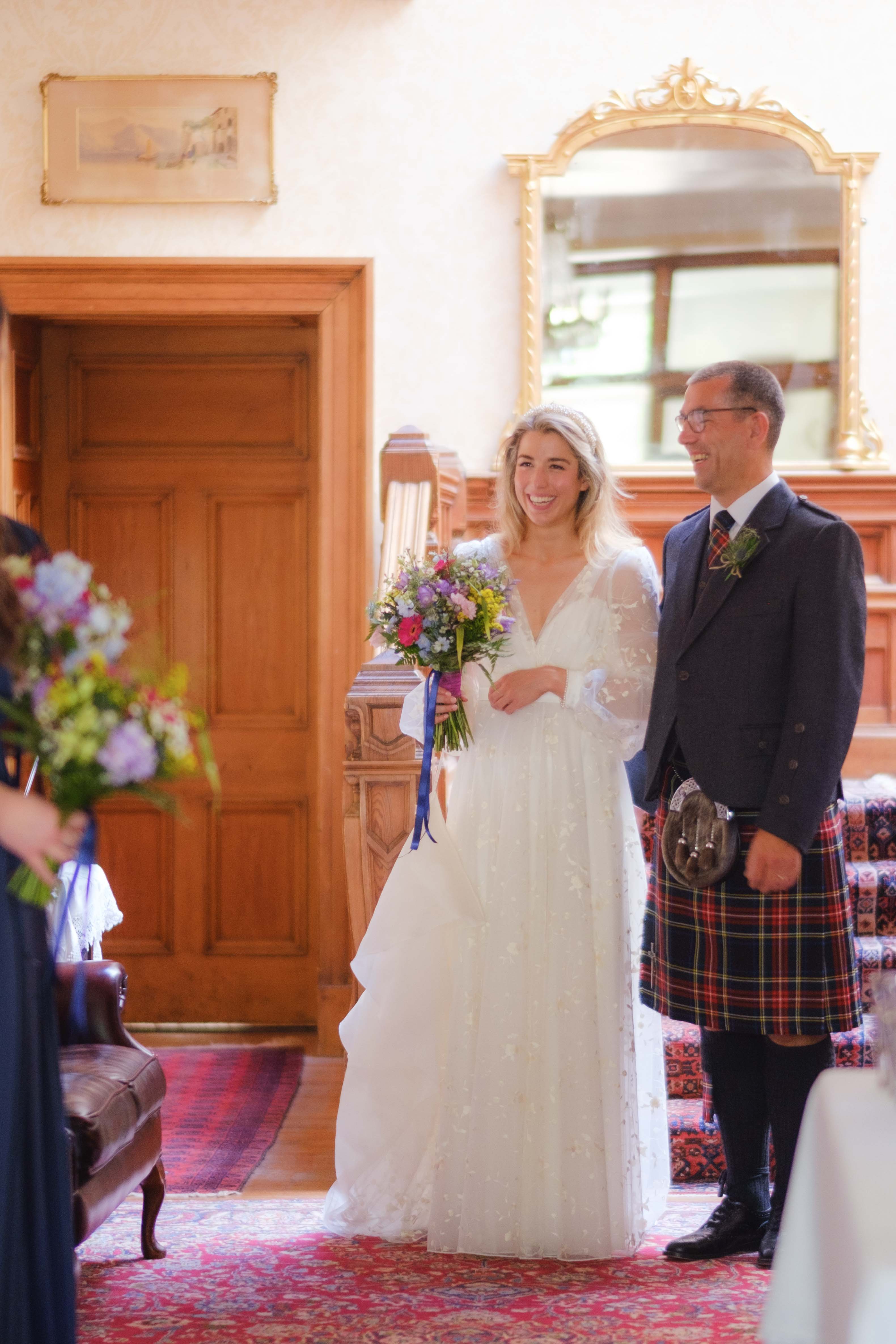 Bride and father of the bride in the entranceway of Kippilaw House, Melrose. Bride and father of the bride in the entranceway of Kippilaw House, Melrose.