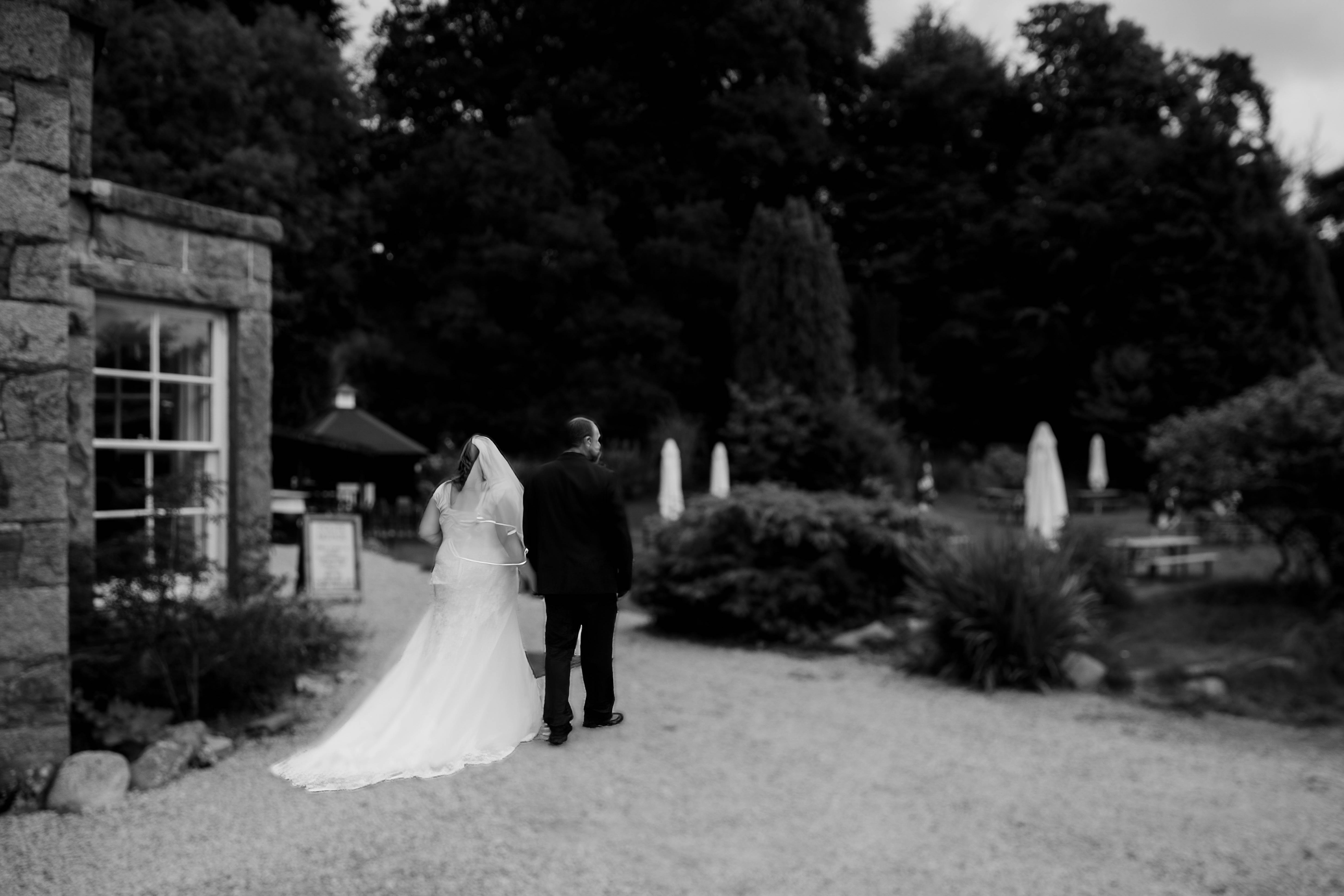 Bride and groom walking in gardens, Creebridge House Hotel, Dumfries and Galloway Bride and groom walking in gardens, Creebridge House Hotel, Dumfries and Galloway