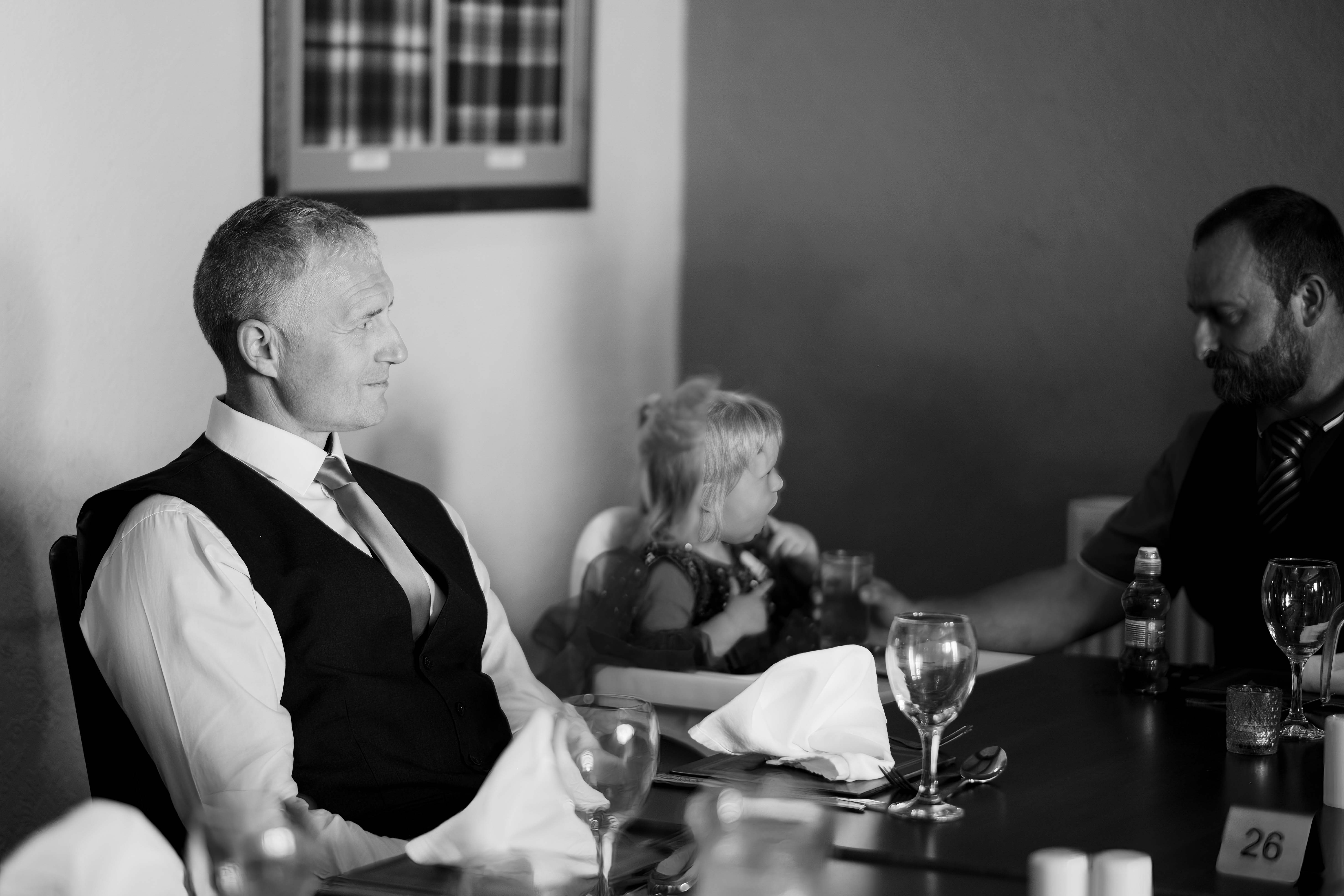 Wedding guest natural candid shot during wedding reception. Wedding guest natural candid shot during wedding reception.