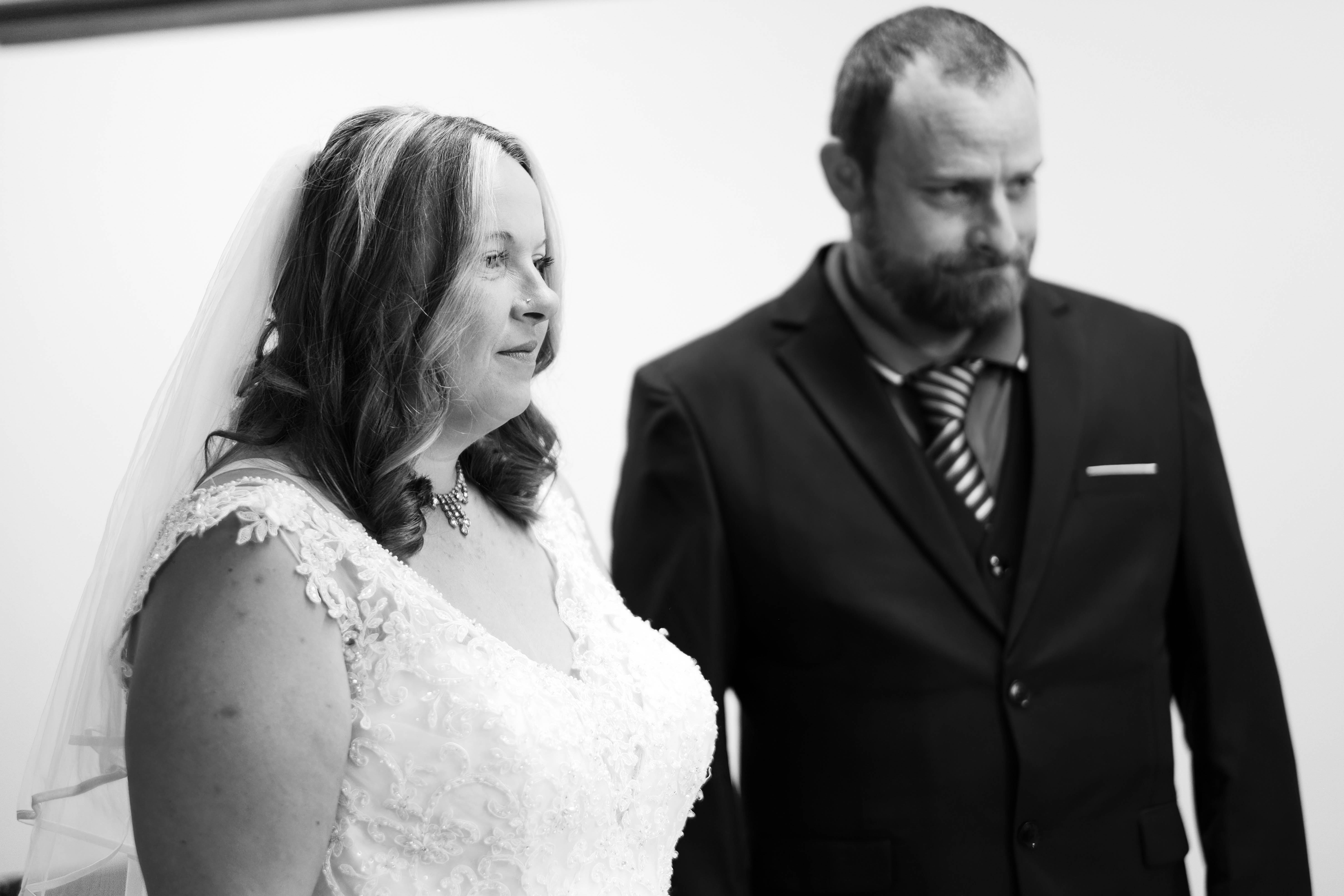Bride and groom during wedding ceremony at Newton Stewart Registry Office Bride and groom during wedding ceremony at Newton Stewart Registry Office