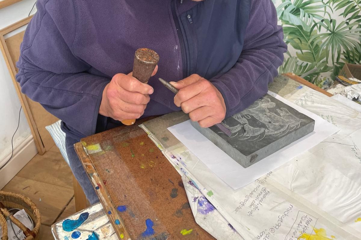 Diana carving during an art course.