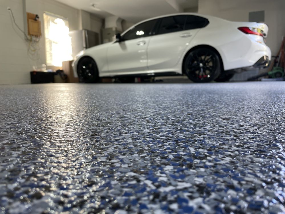 Finished epoxy flake garage floor in Midland Odessa area