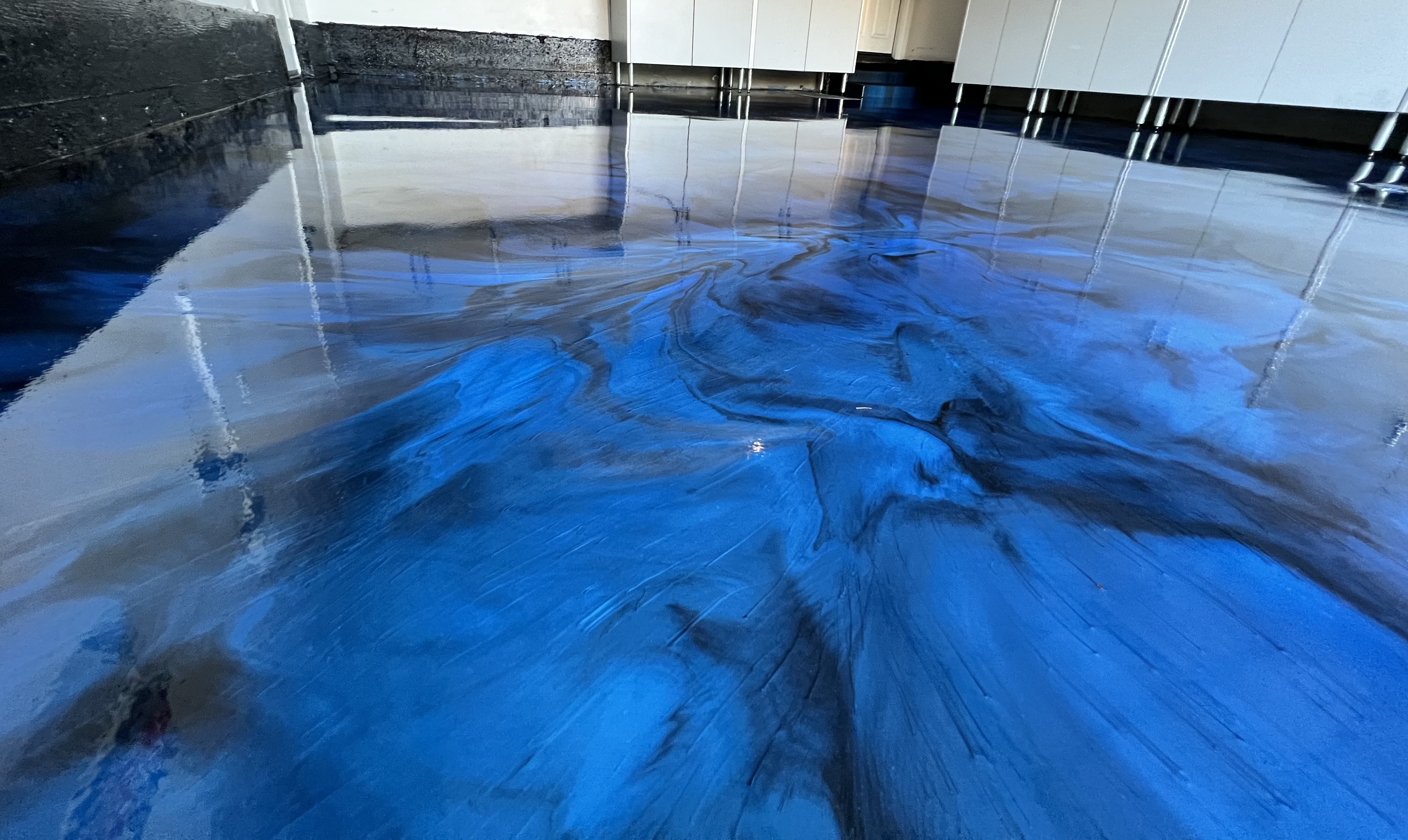 Metallic epoxy floor finish installed in Midland Texas