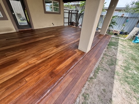 Wood look decorative concrete overlay for an outdoor patio in Odessa Texas