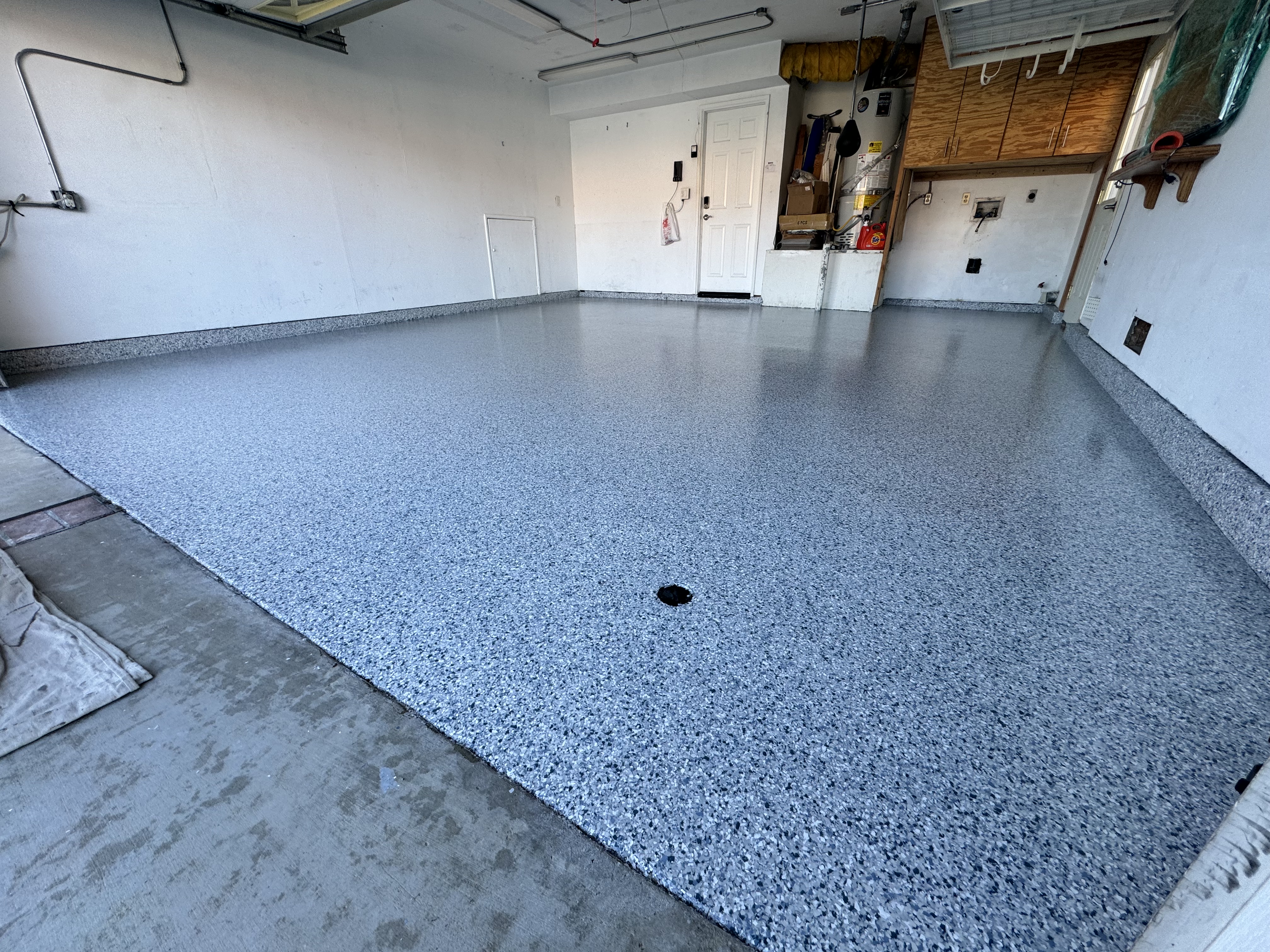 Garage epoxy floor with full flake broadcast and clear topcoat