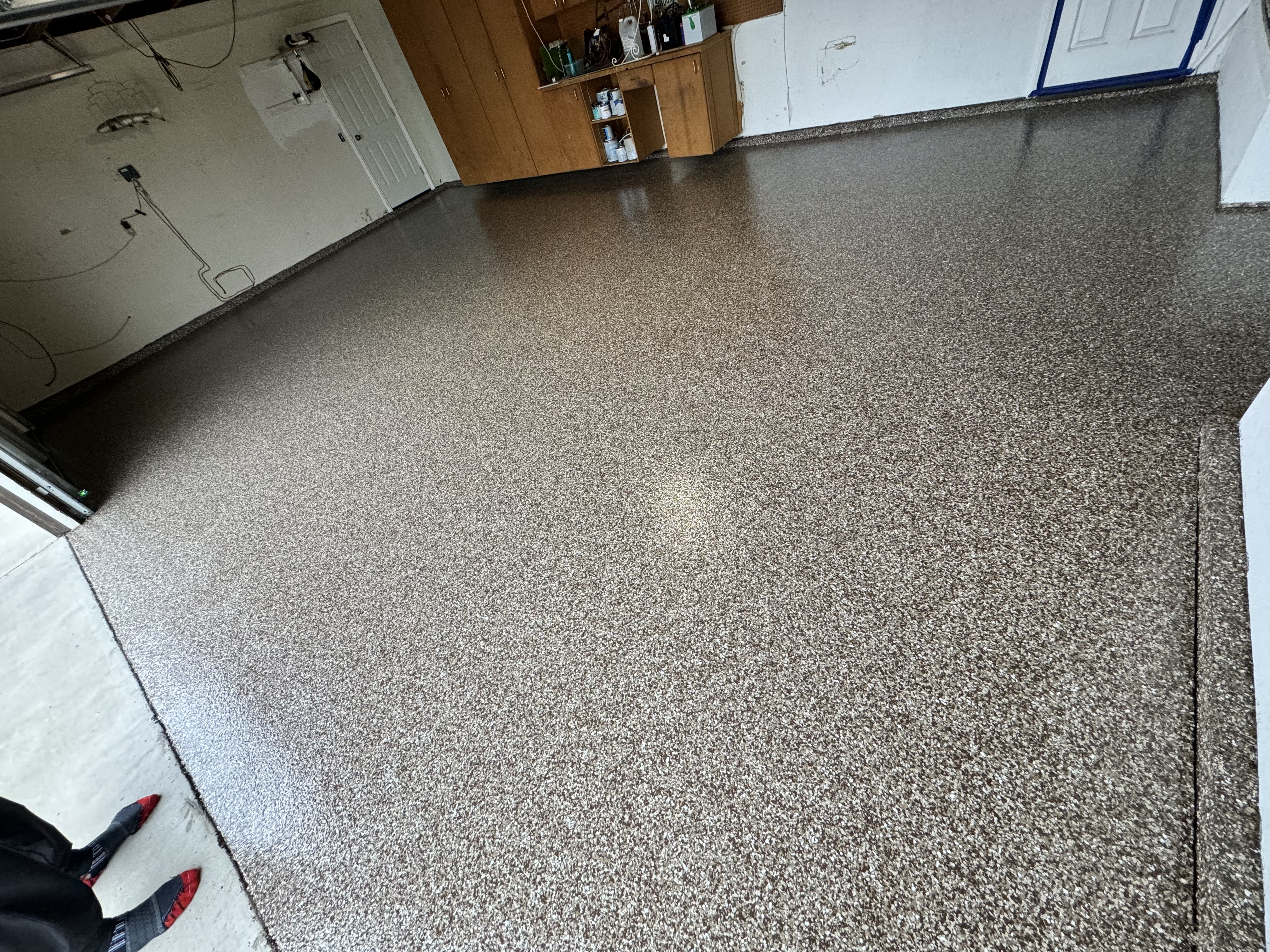 Custom epoxy flake floor finish in Odessa garage