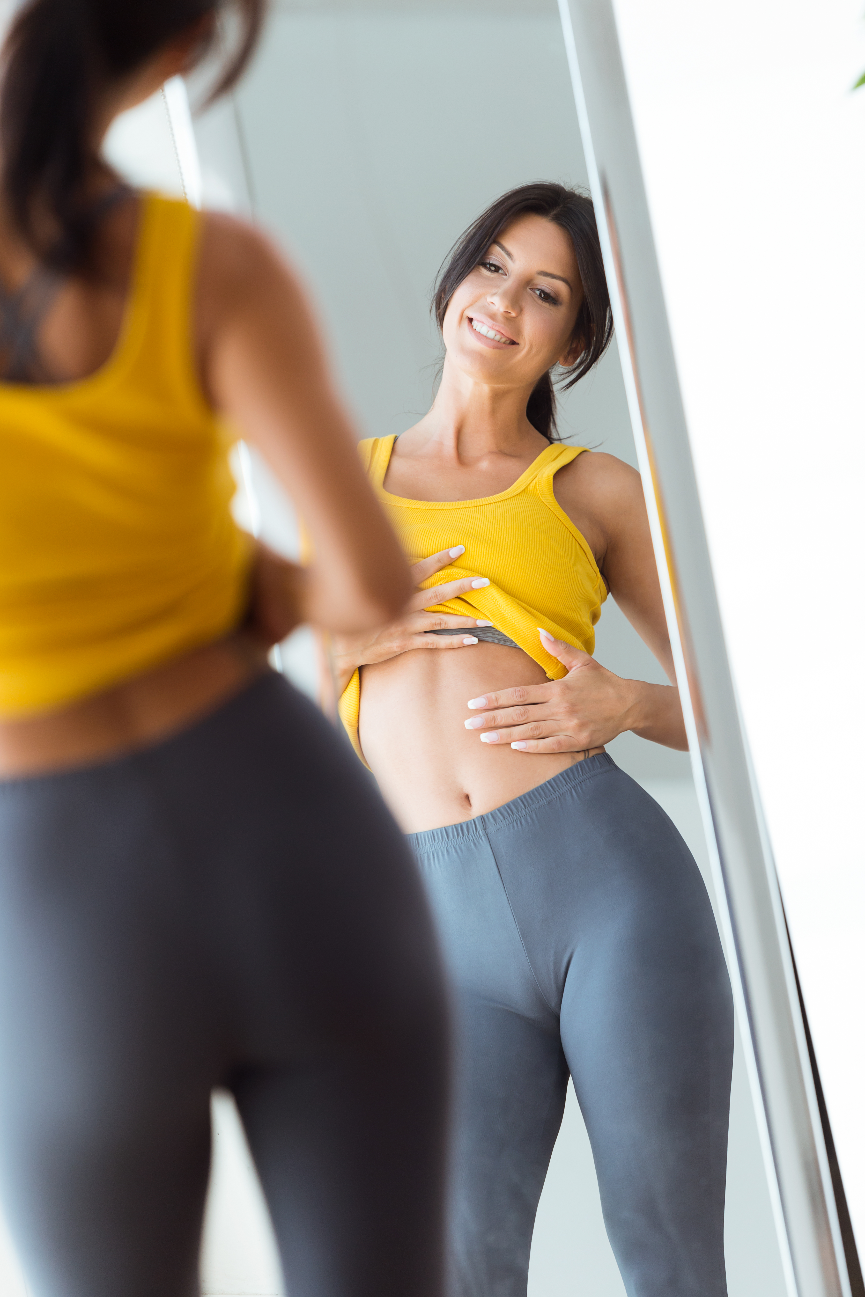 Before and after results of Lipo-Light body contouring treatment