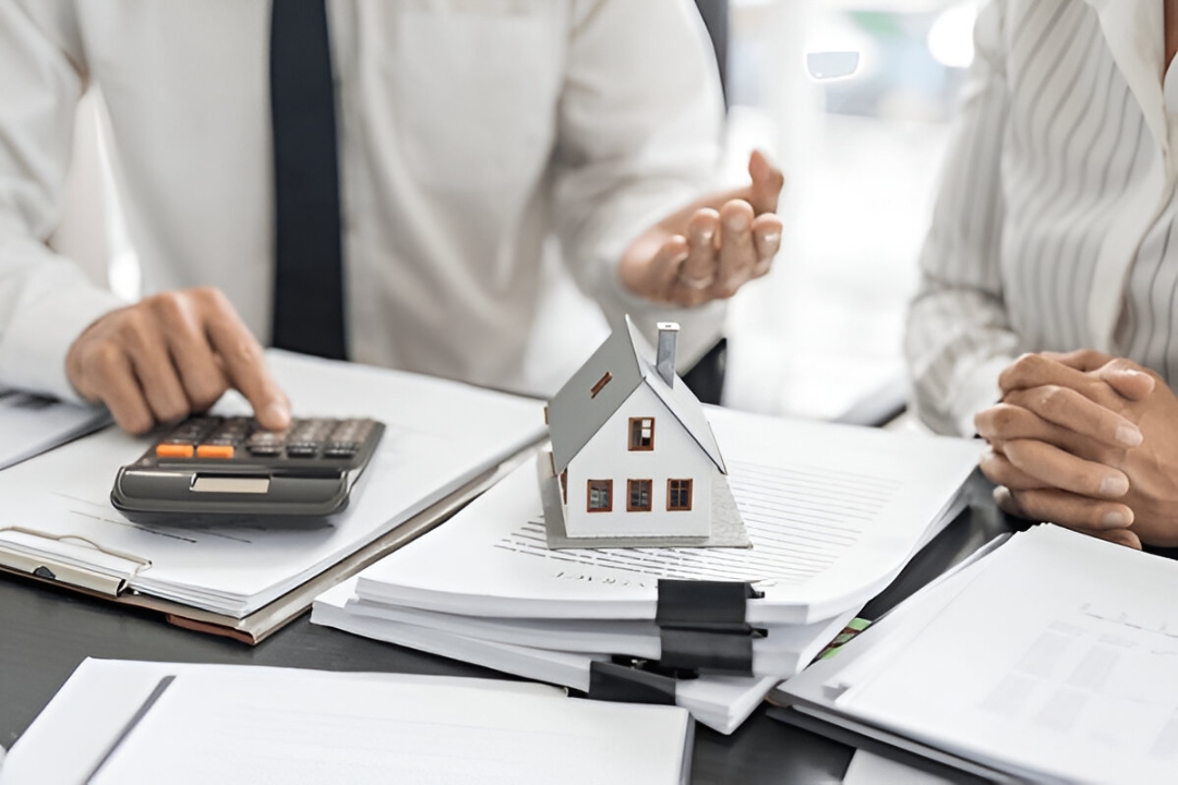 A realtor uses a calculator, helping Penalty box home buyers navigate financial options with KBR Investing. A realtor uses a calculator, helping Penalty box home buyers navigate financial options with KBR Investing.