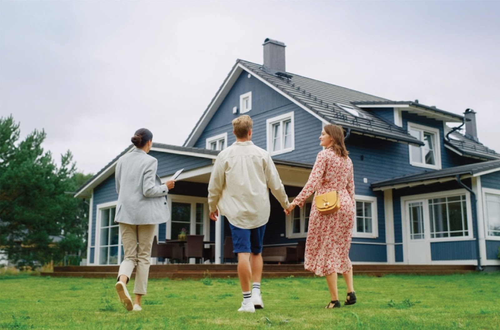 A happy family and a KBR Investing agent stand before a house, representing Owner financing for people denied by banks. A happy family and a KBR Investing agent stand before a house, representing Owner financing for people denied by banks.