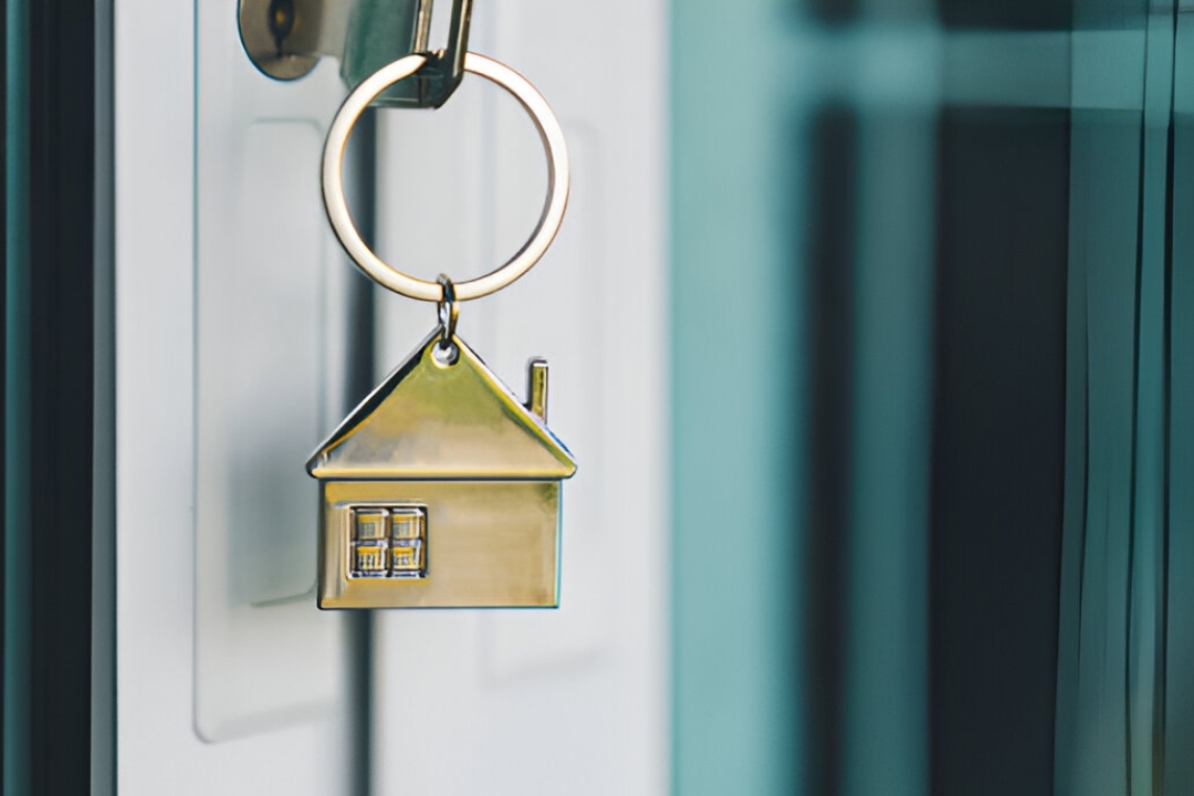 A key with a house charm dangling from a doorknob, symbolizing opportunities for Overcoming bank rejection with owner financing by KBR Investing. A key with a house charm dangling from a doorknob, symbolizing opportunities for Overcoming bank rejection with owner financing by KBR Investing.