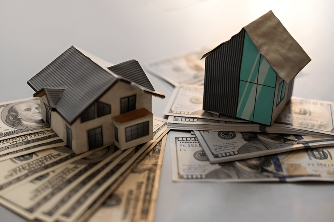 A key with a house charm on a mortgage document with a calculator, representing KBR Investing's services to Buy a home with low credit. A key with a house charm on a mortgage document with a calculator, representing KBR Investing's services to Buy a home with low credit.