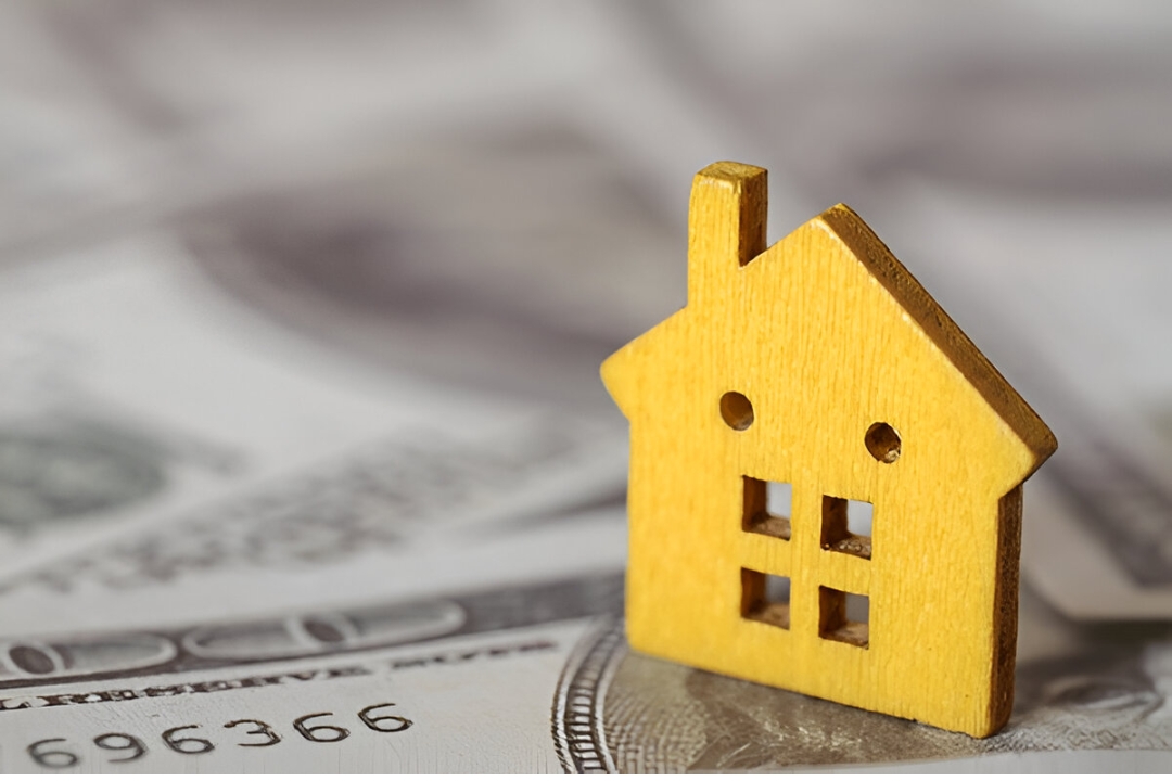 A real estate agent assists a couple in understanding how to Buy a home without a bank with KBR Investing. A real estate agent assists a couple in understanding how to Buy a home without a bank with KBR Investing.