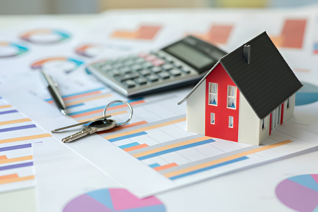 A house model, keys, and a calculator on financial charts, illustrating options for Non-citizen home loans from KBR Investing. A house model, keys, and a calculator on financial charts, illustrating options for Non-citizen home loans from KBR Investing.