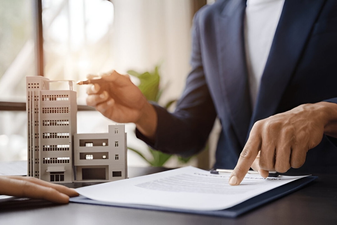  A man reviews documents and uses a calculator, aiding with No credit check homes from KBR Investing.
