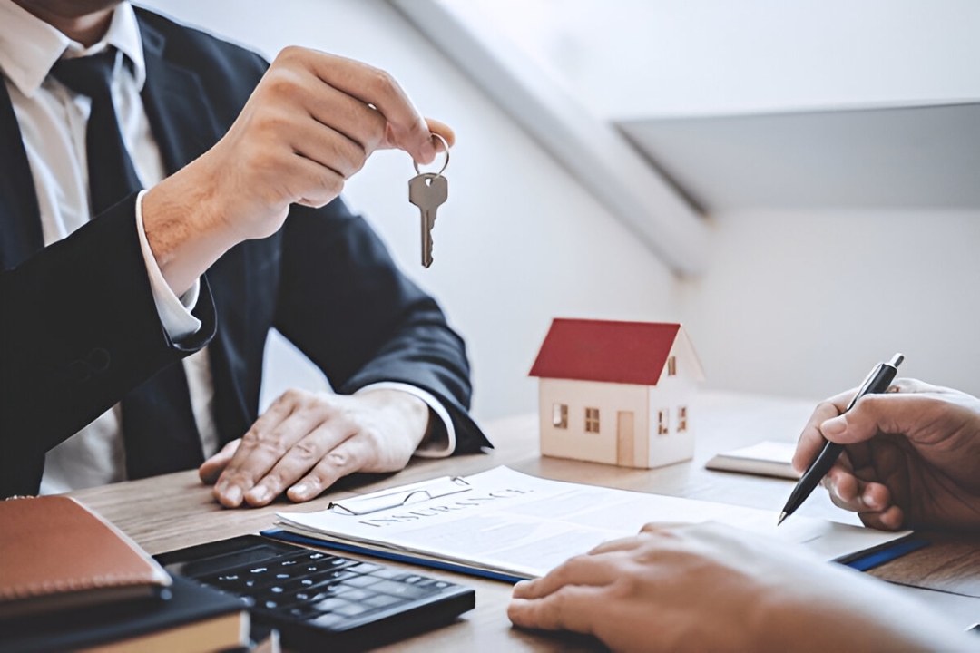 A professional sits at a desk with a house model and papers, offering No bank mortgage alternatives from KBR Investing. A professional sits at a desk with a house model and papers, offering No bank mortgage alternatives from KBR Investing.
